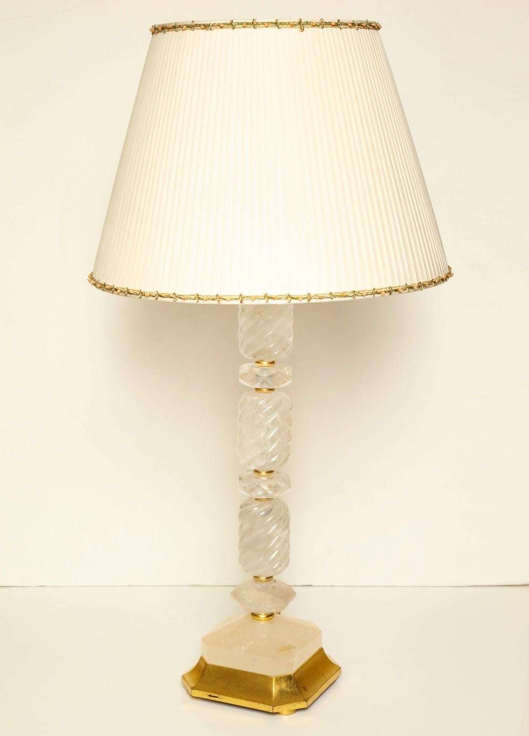 A pair of rock crystal table lamps, giltwood elements, wired for electricity, and fitted with two Edison sockets each, maximum wattage per socket: 100W.