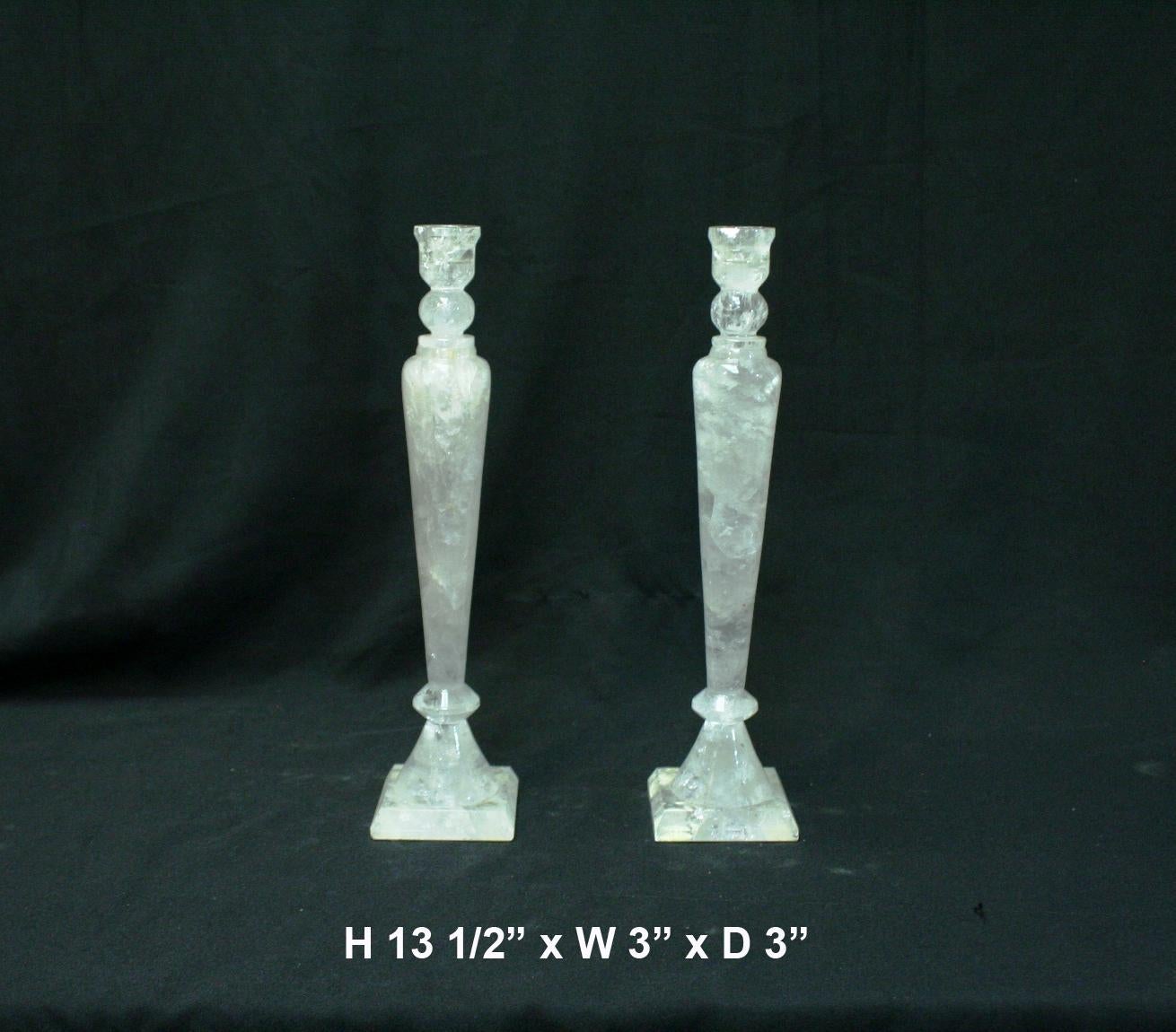 A beautiful pair of finely hand carved and hand polished rock crystal tall candlesticks.
 