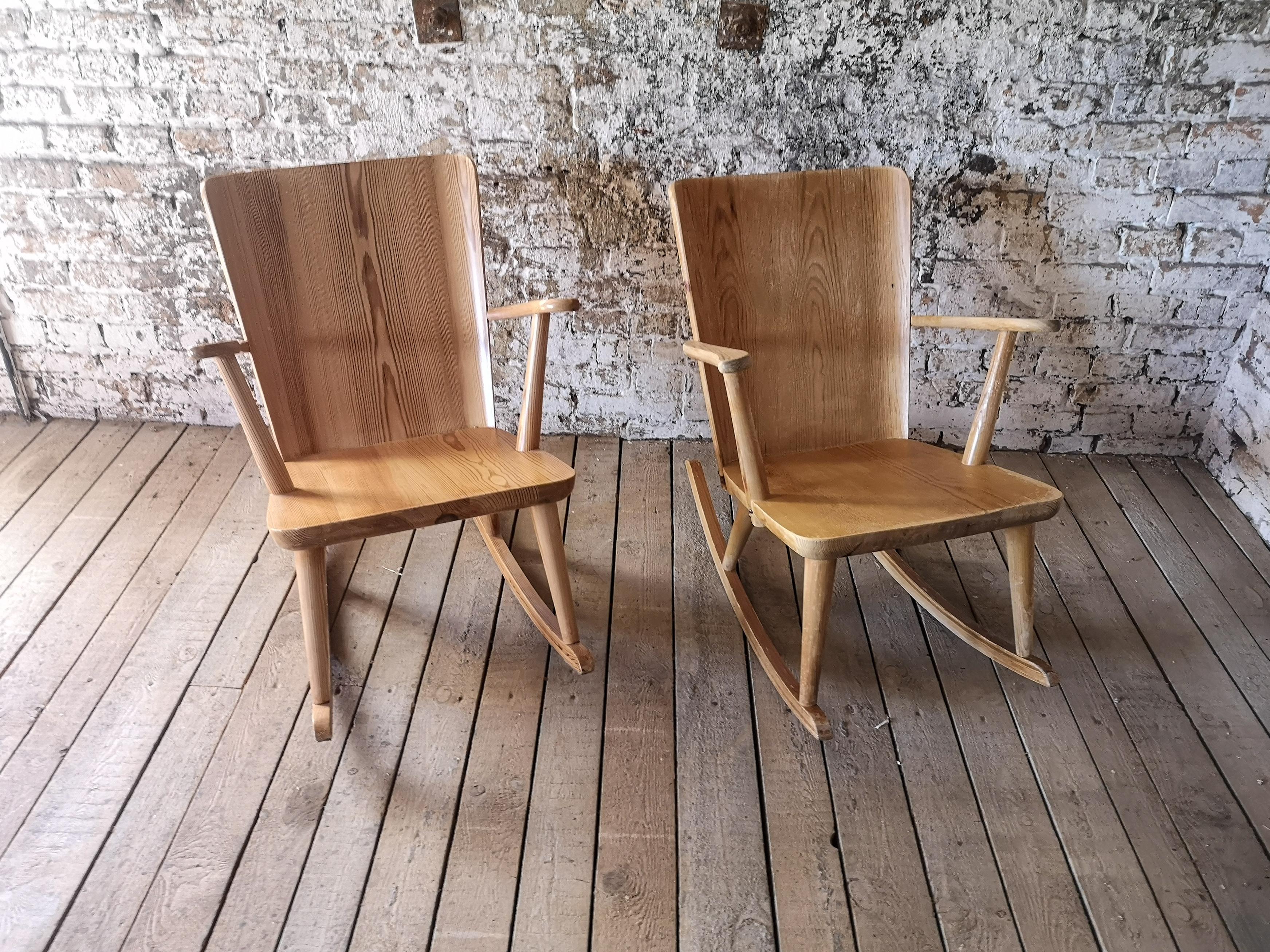 Rocking chairs, made in solid pine, designed by Göran Malmvall for Svensk Fur, Sweden. 
Modernist design in traditional Swedish workmanship, made to adapt to the new era in the late 1930s and early 1940s Swedish summer houses. 

One of the chairs