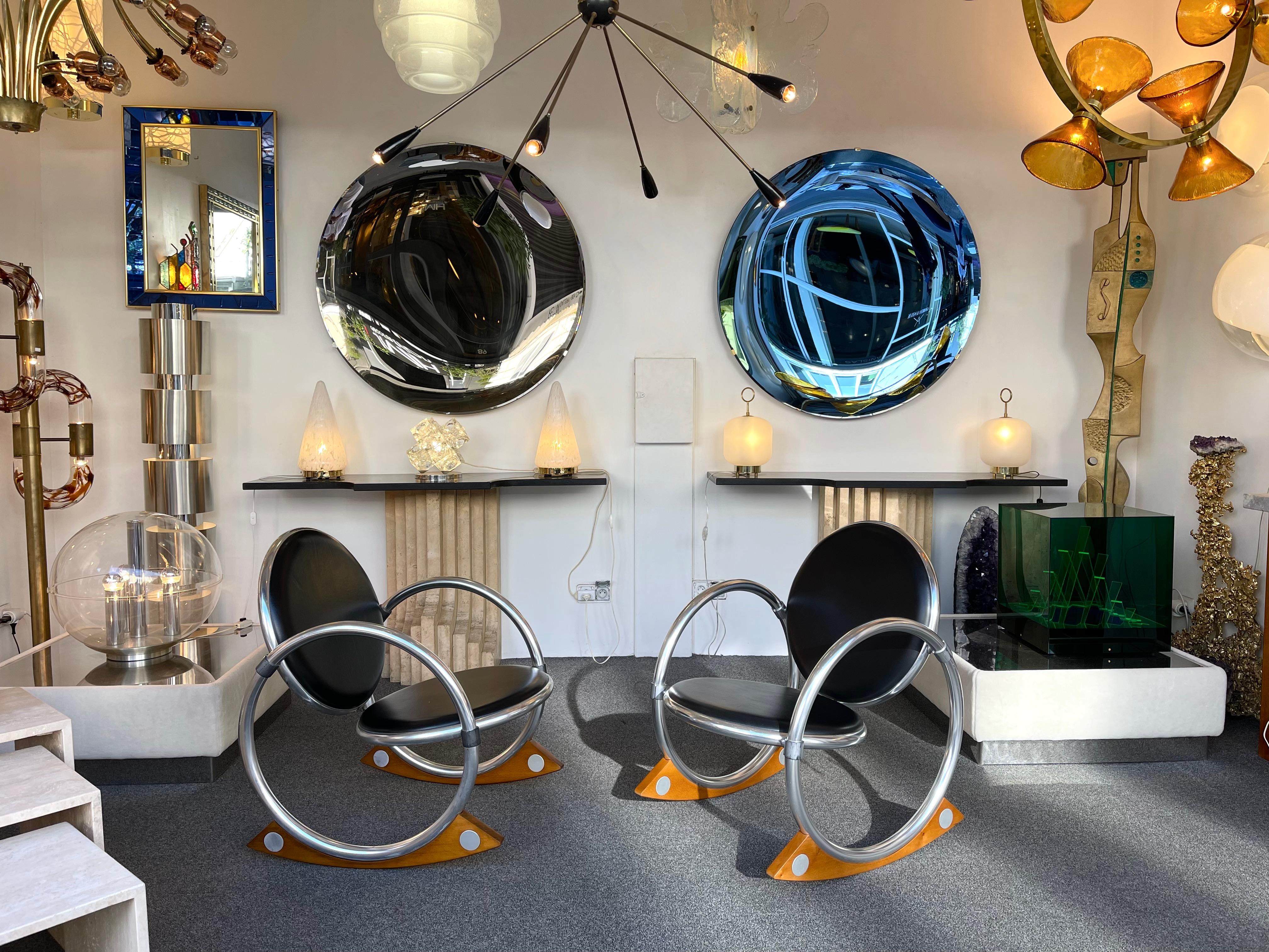 Mid-Century Modern space age design pair of armchairs or lounge rocking chairs model Dondolo in metal, leather and wood feet by the Iconic Danish designer Verner Panton for the italian editor manufacture Ycami. Famous design like Gio Ponti,