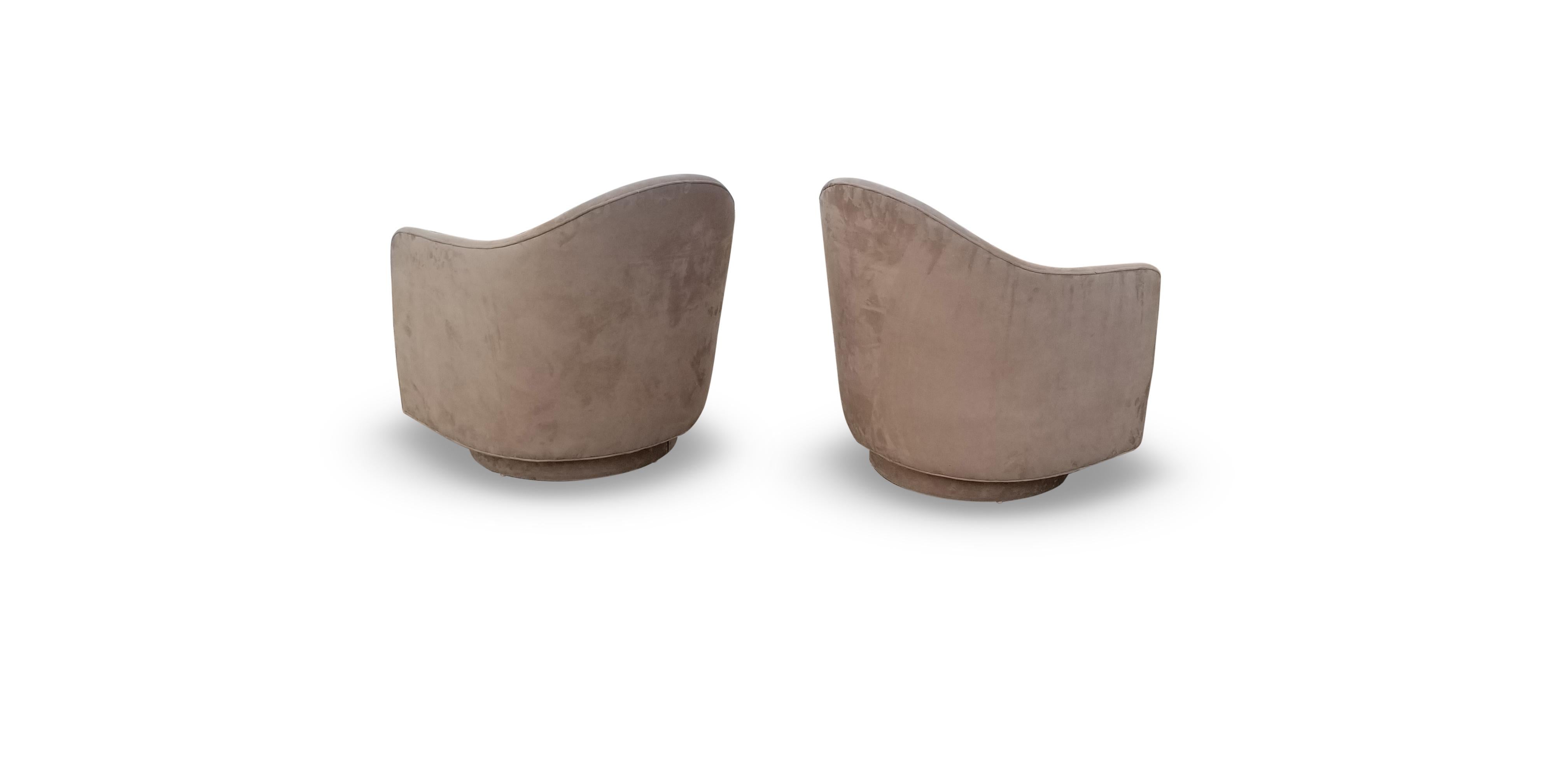 20th Century Pair of Rocking Swivel Lounge Chairs by Milo Baughman