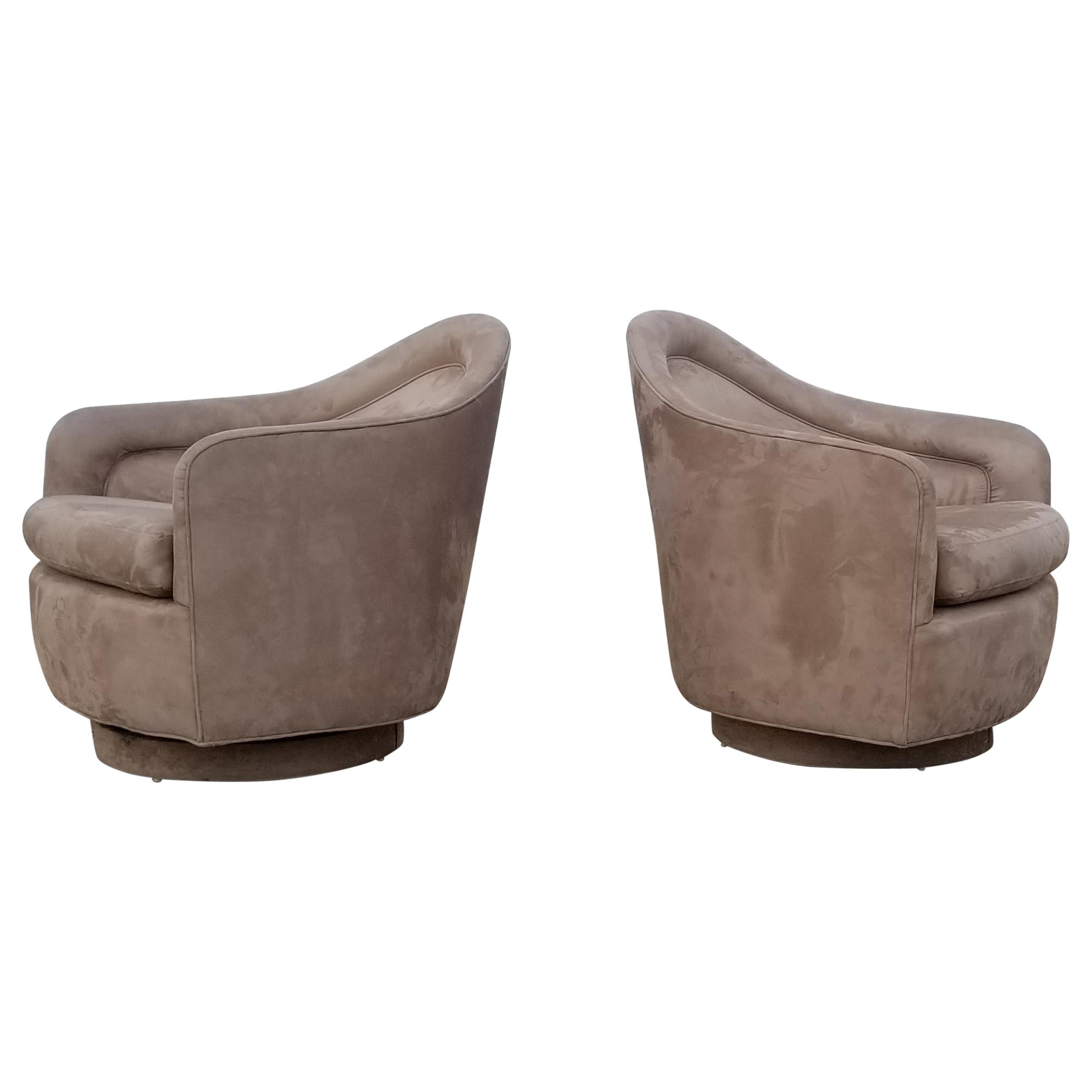 Pair of Rocking Swivel Lounge Chairs by Milo Baughman
