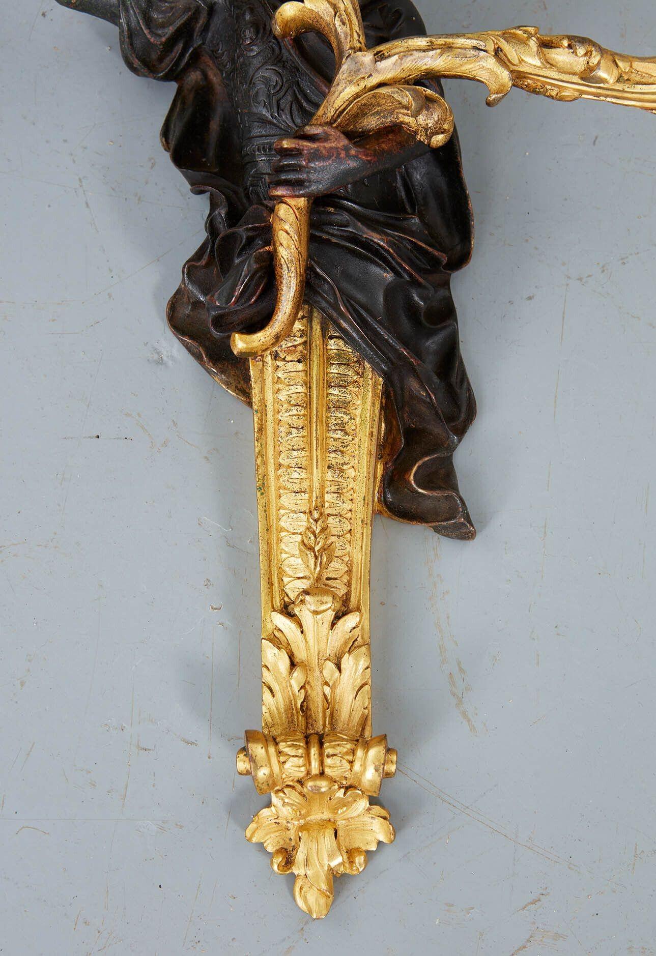 Cast Pair of Rococo Bronze and Gilt Sconces For Sale
