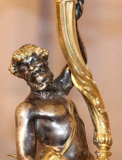 Pair of Rococo Gilt Bronze Candelabra's with Gilt Silver Figures