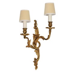 Pair of Rococo Gilt Bronze Two Arm Wall Sconces