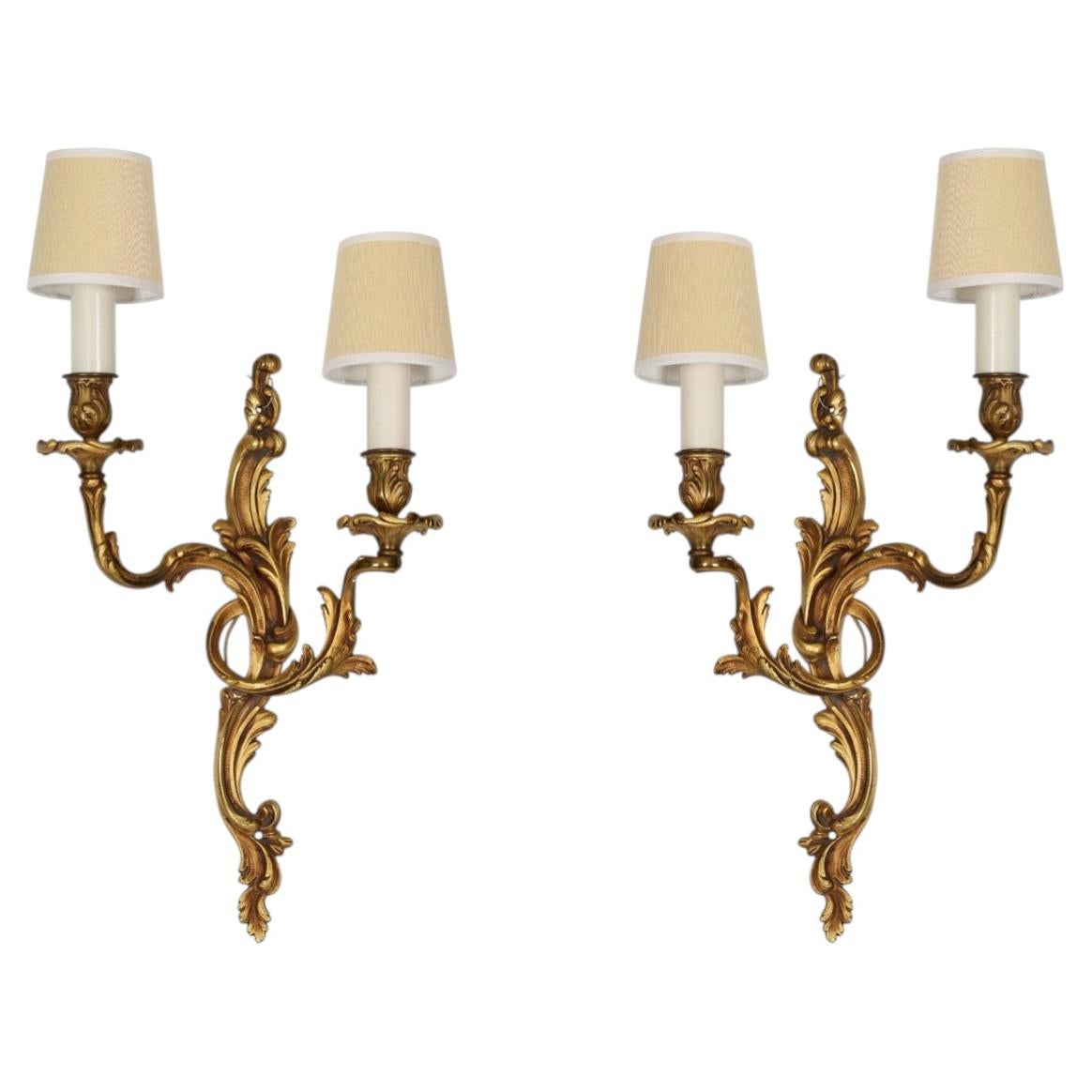 Pair of Rococo Gilt Bronze Two Arm Wall Sconces For Sale
