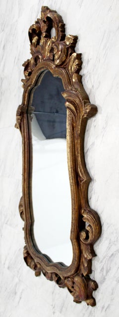 Pair of Rococo Hollywood Regency Style Gold Gilt Leaf Hanging Wall Mirrors