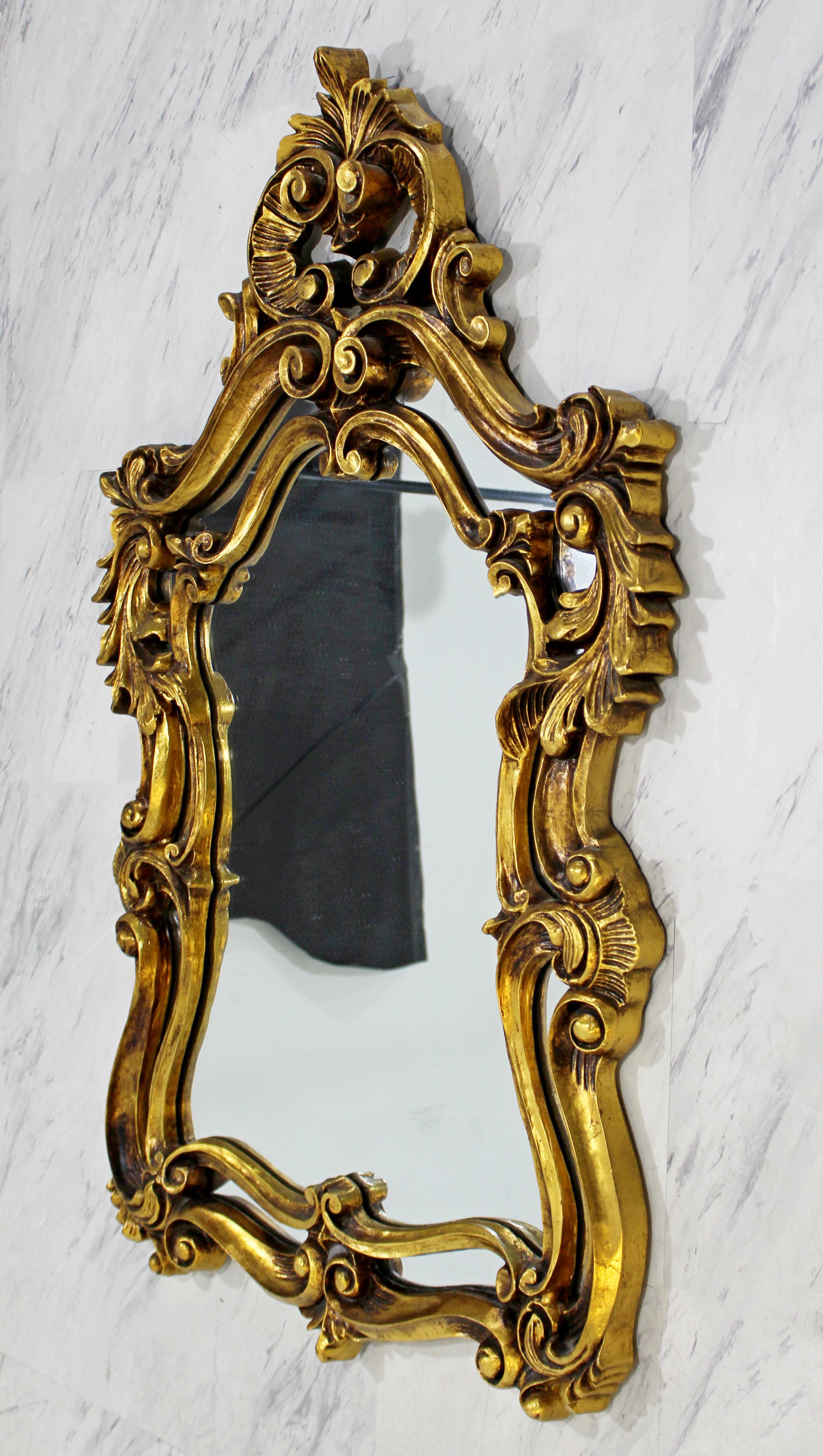 Pair of Rococo Hollywood Regency Style Gold Gilt Leaf Hanging Wall Mirrors In Good Condition In Keego Harbor, MI