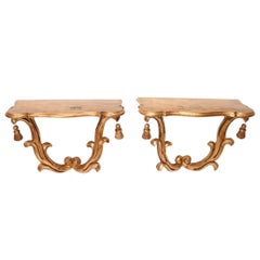 Pair of Rococo Style Giltwood Wall Consoles With Tassel Detail