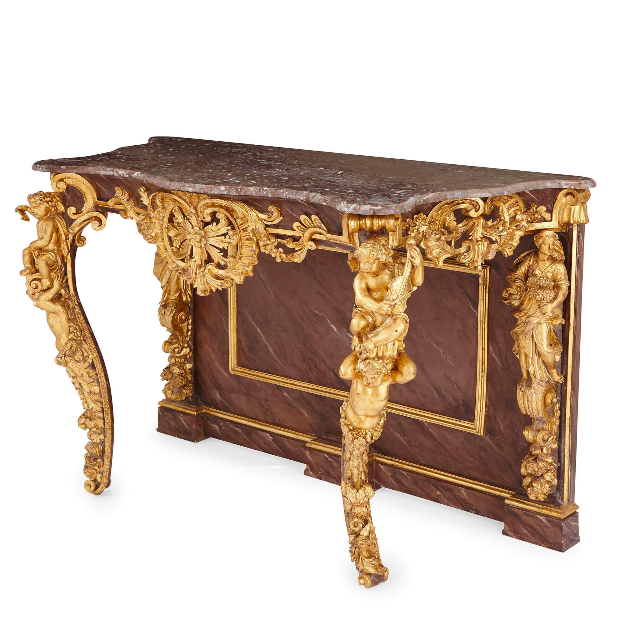 Pair of Rococo style Italian giltwood and marble pier tables
Italian, 19th Century
Measures: Height 93cm, width 130cm, depth 65cm

These exceptional pier tables are designed in the Louis XV style. The tables are crafted from giltwood, marble,