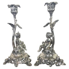 Pair of Rococo Style Silver Cherub Candlesticks-Early 20th Century