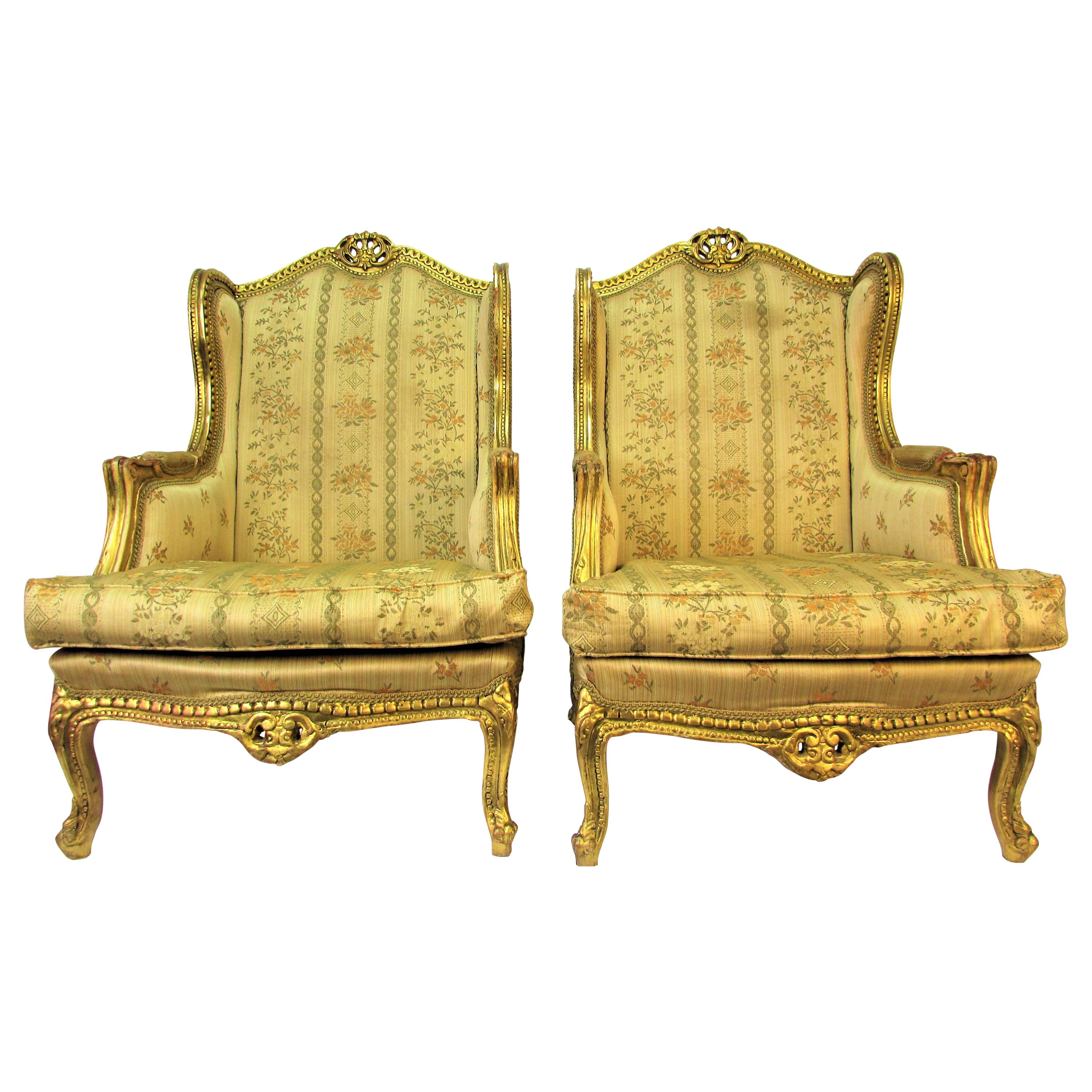 Pair of Rococo Style Vintage Wingback Gold Gilt Hand Carved Chairs For Sale