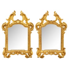 paire de miroirs romains en bois doré d
époque Louis XIV du début du 18e siècle