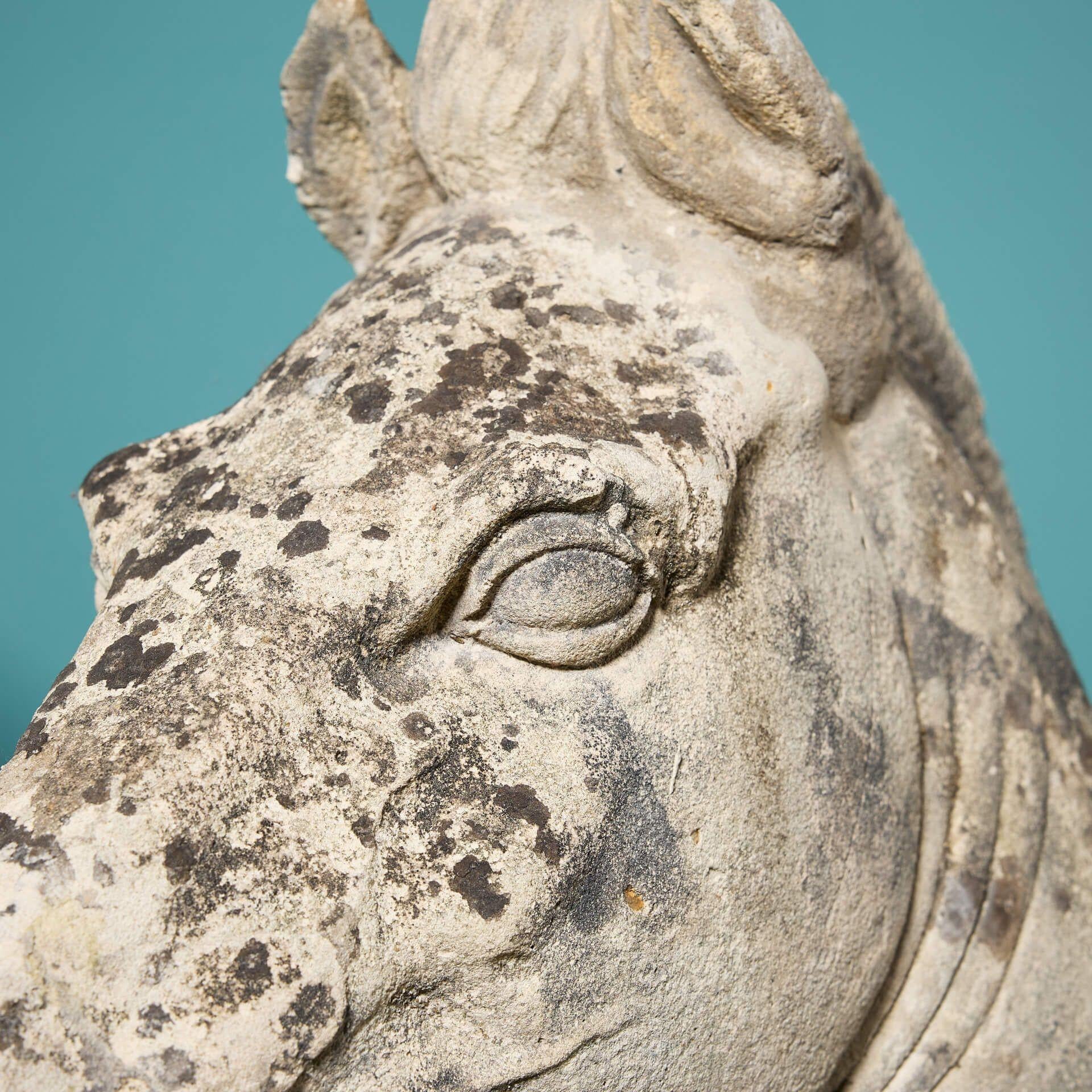 Neoclassical Pair of Roman Style Weathered Stone Horse Heads For Sale