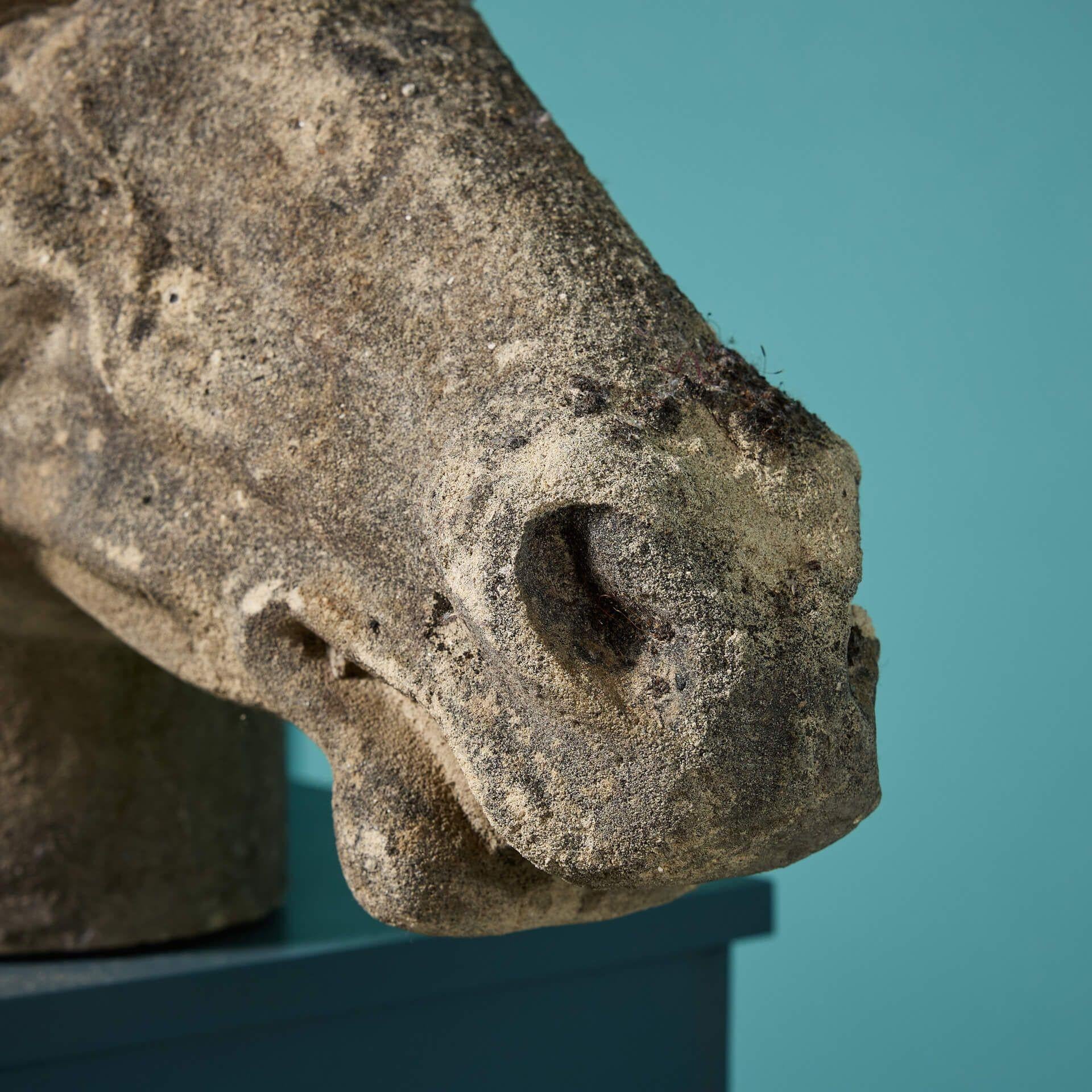 Pair of Roman Style Weathered Stone Horse Heads In Fair Condition For Sale In Wormelow, Herefordshire