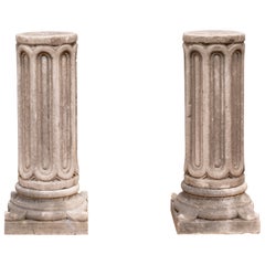 Pair of Romanesque Arched Form Carved Marble Pedestals