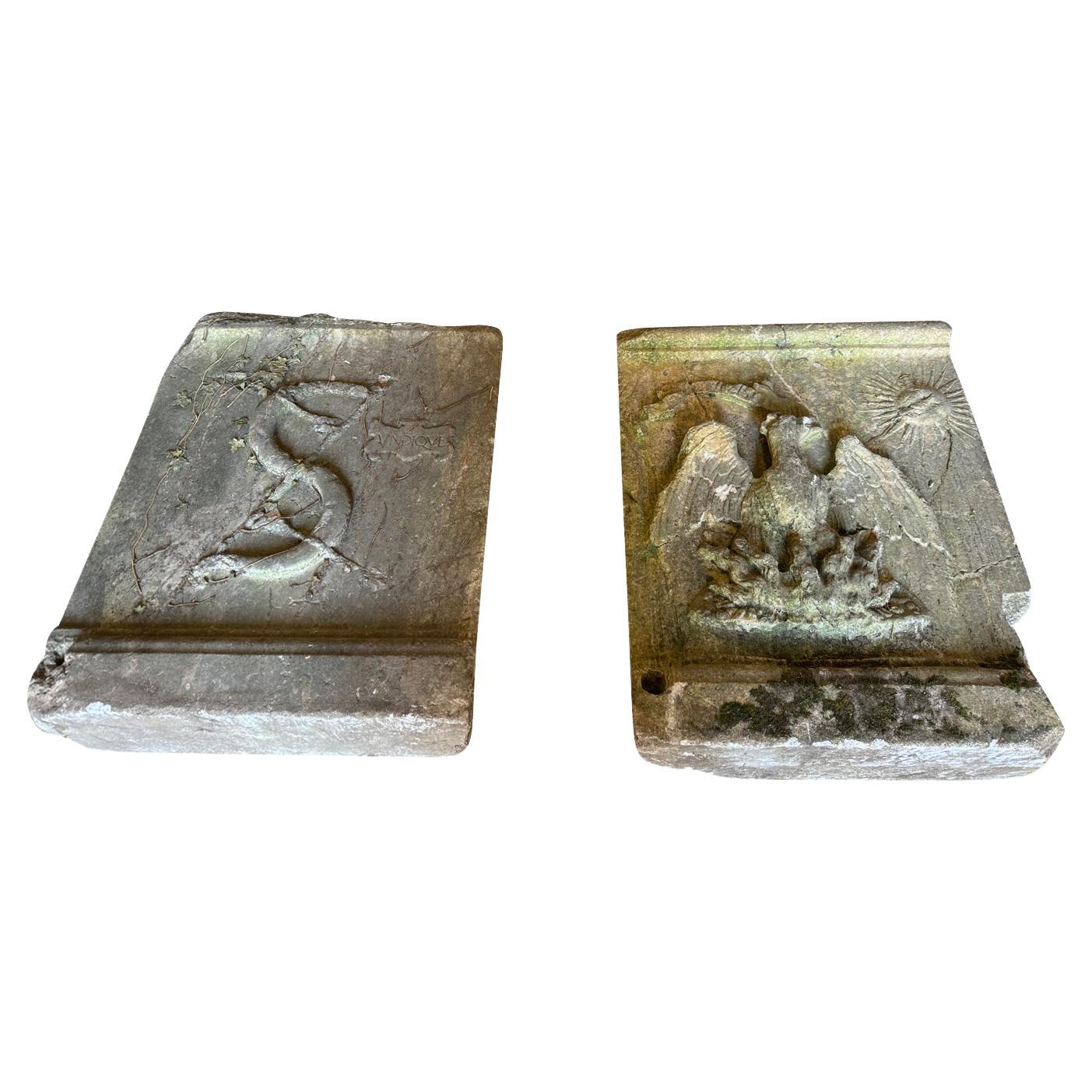 A sensational pair of Romanesque Blason - Coat Of Arms from Vichy, France.  Beautifully carved from stone.  One piece with a striking eagle and sun.  The other with an
