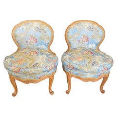 Pair of Romantic 19th Century French Carved Walnut Slipper Chairs