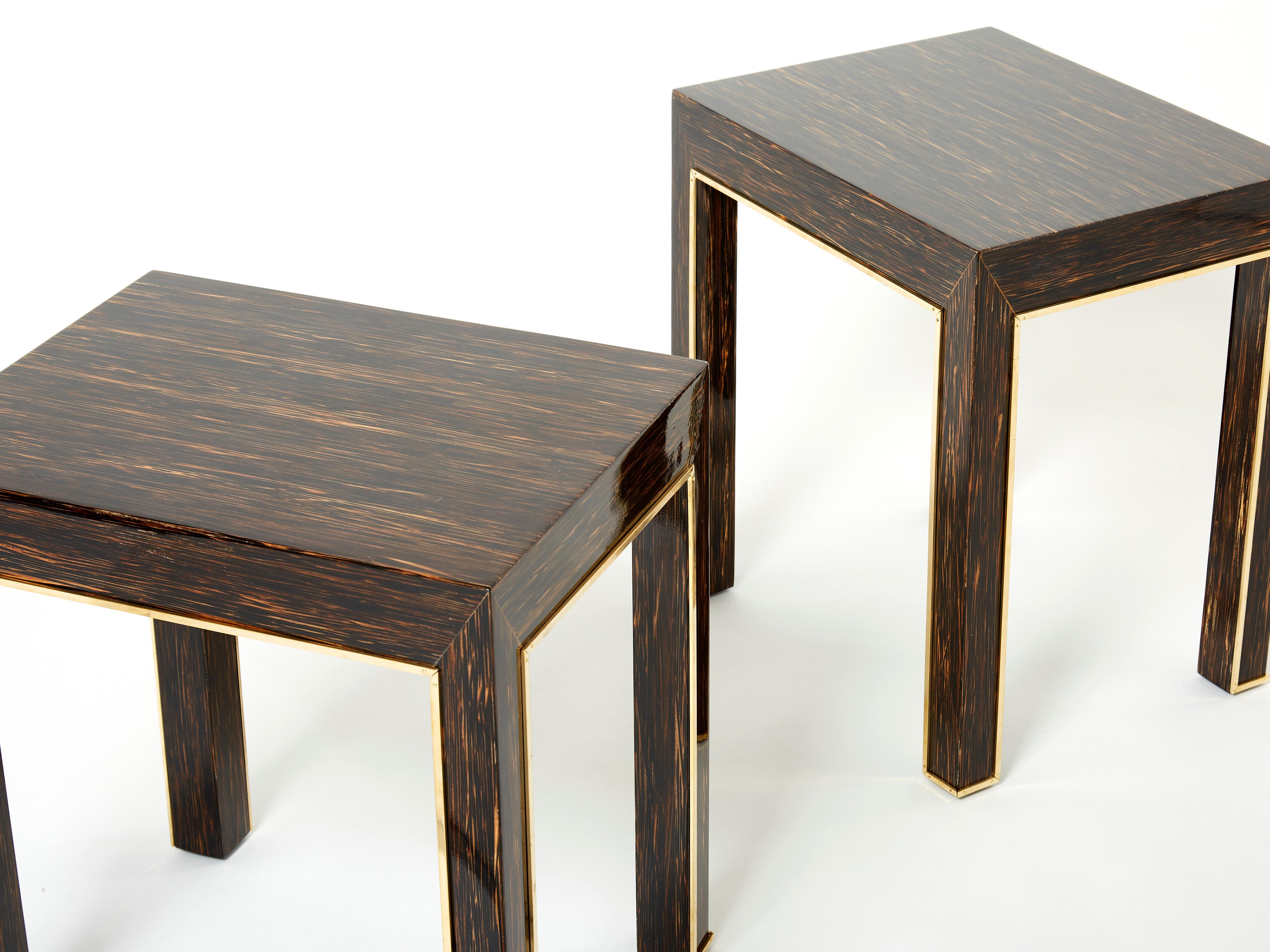 This pair of end tables from the 1970s is a beautiful example of French design firm Maison Romeo Paris. With its sleek look, it feels inspired by Art Deco design, reminiscent of the collaborative work from Jacques Adnet and Jacques Lenoble. The