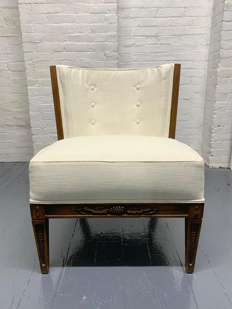 Pair of Romweber side chairs. The chairs frame is solid carved oak with reupholstered linen-blend fabric.