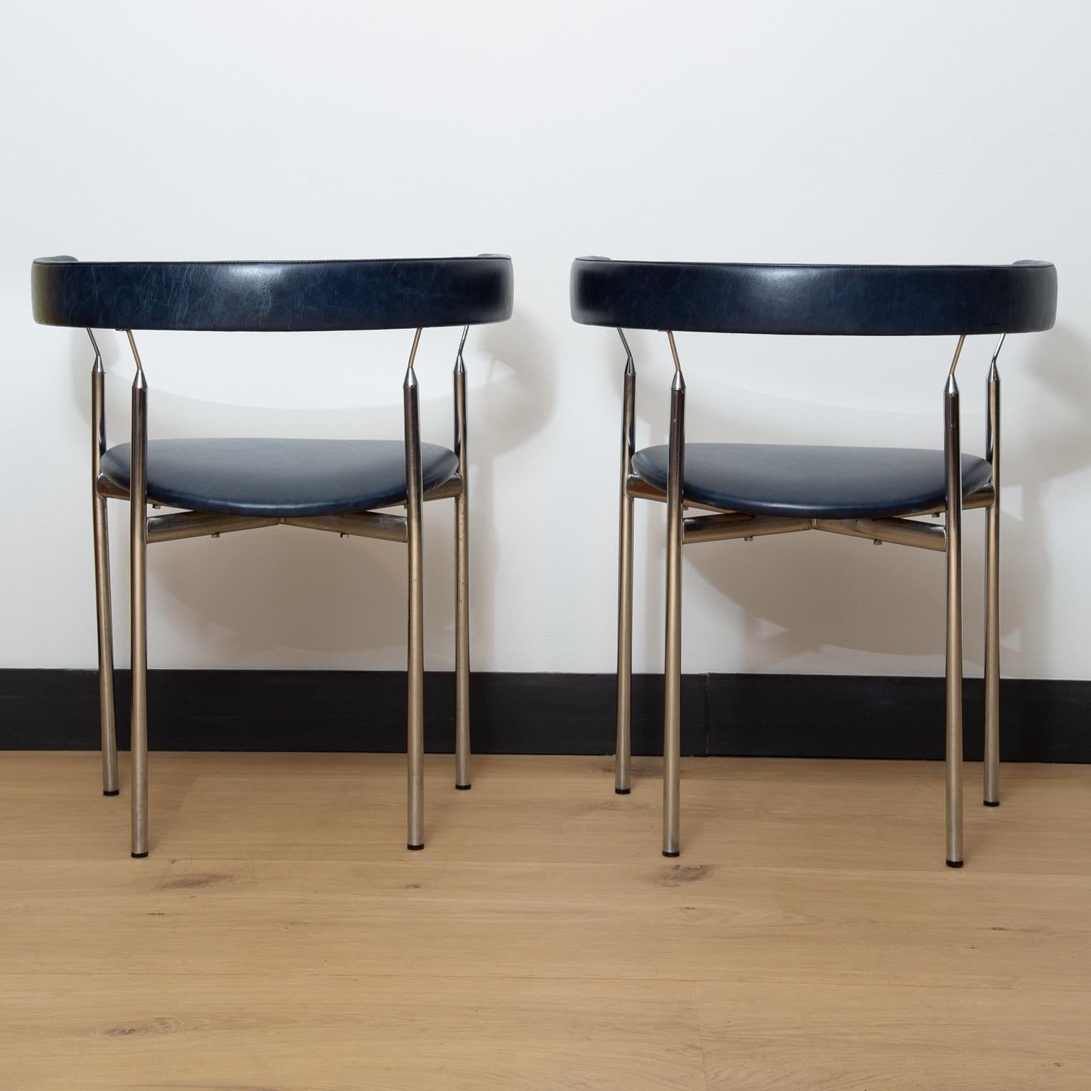 A pair of chrome frame 'Rondo' chairs designed by Jan Lunde Knudsen for Sorlie Møbler.
The chairs have been reupholstered in navy blue Italian leather.