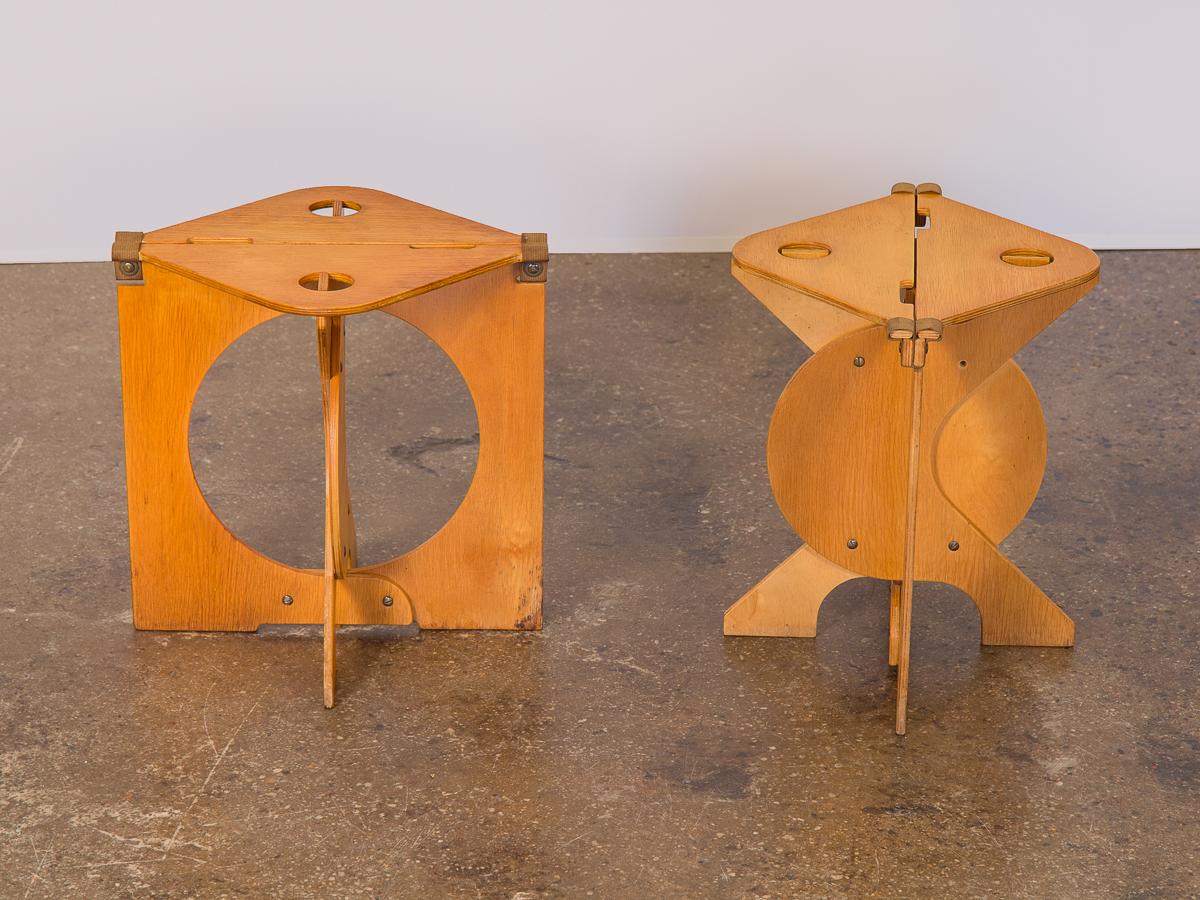 The Rooster folding stool designed by Design/Build architect Barry Simpson. A brilliant, quirky stool design that’s both simple and highly functional. Stools are constructed of graphic, cut-out varnished plywood panels which are in very good