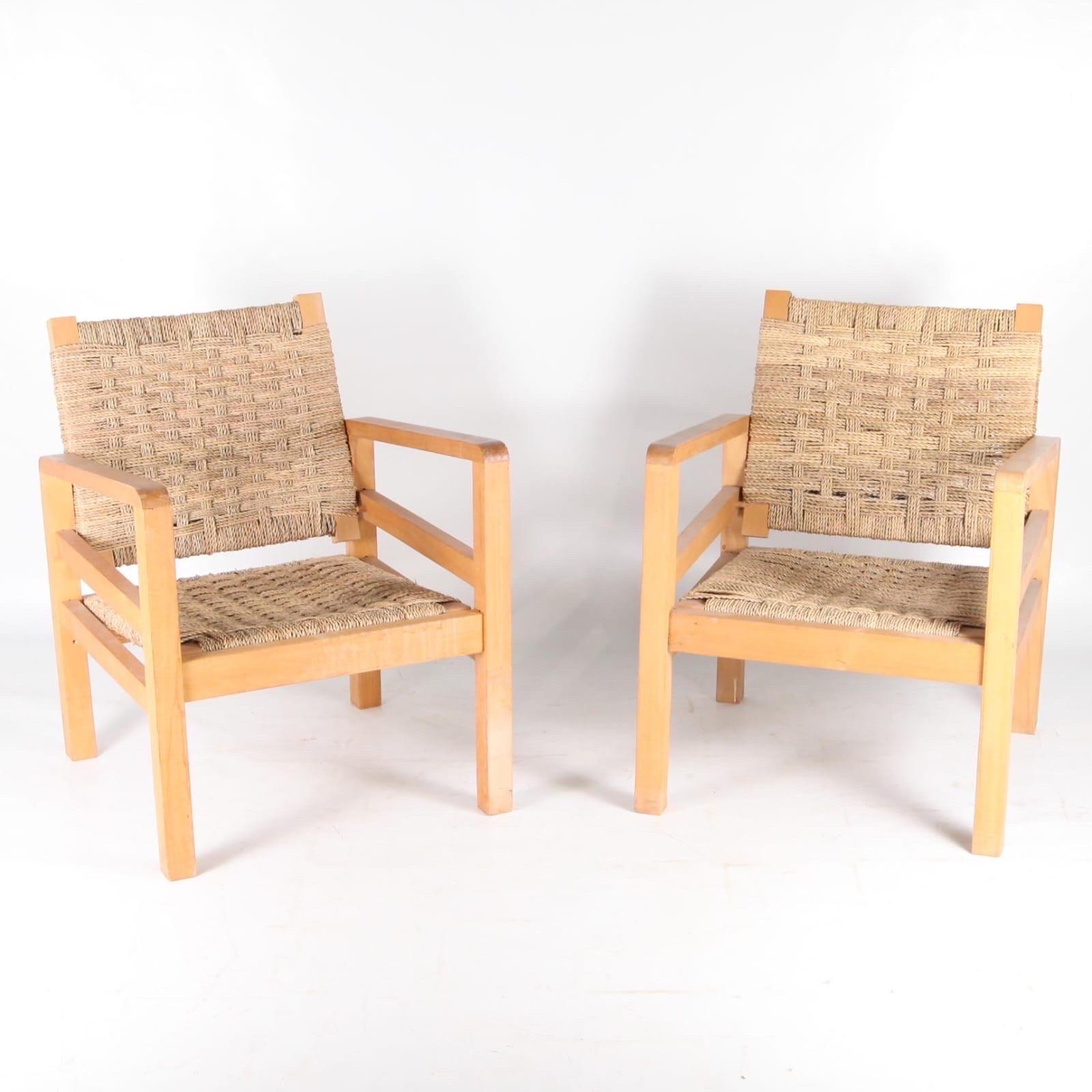 Lovely vintage pair of sea grass rope and wood armchairs in great condition. 