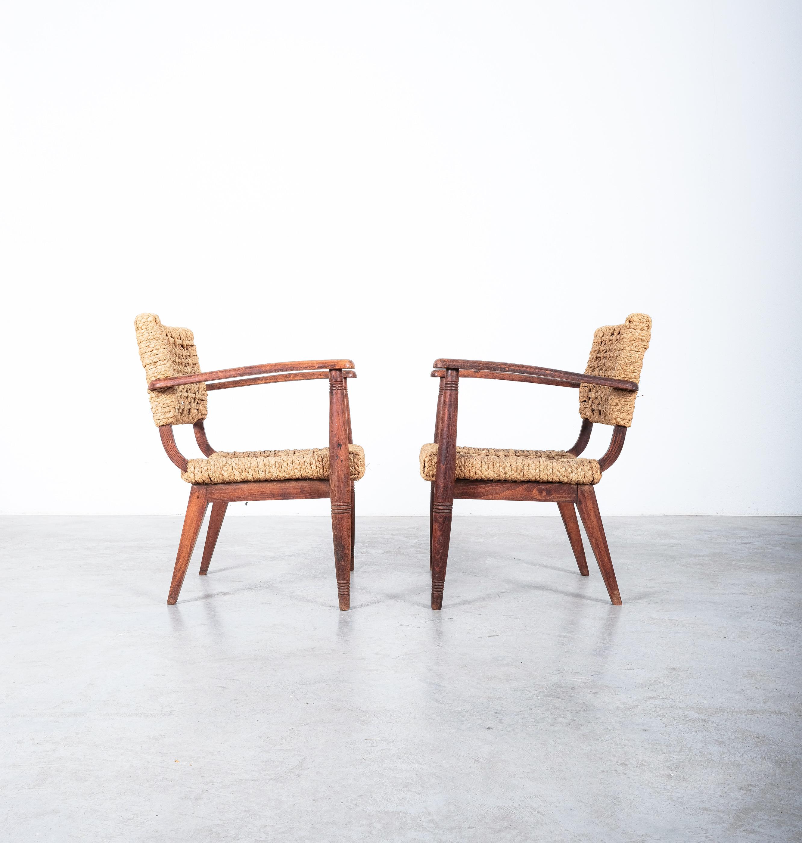 Adrien Audoux and Frida Minet for Vibo, pair of armchairs, beech, rope hemp, France, 1950s.

Gorgeous set of 2 identical arm-chairs, mid-century, by renowned French Designers Adrien Audoux and Frida Minet. The seating and backrest are made of