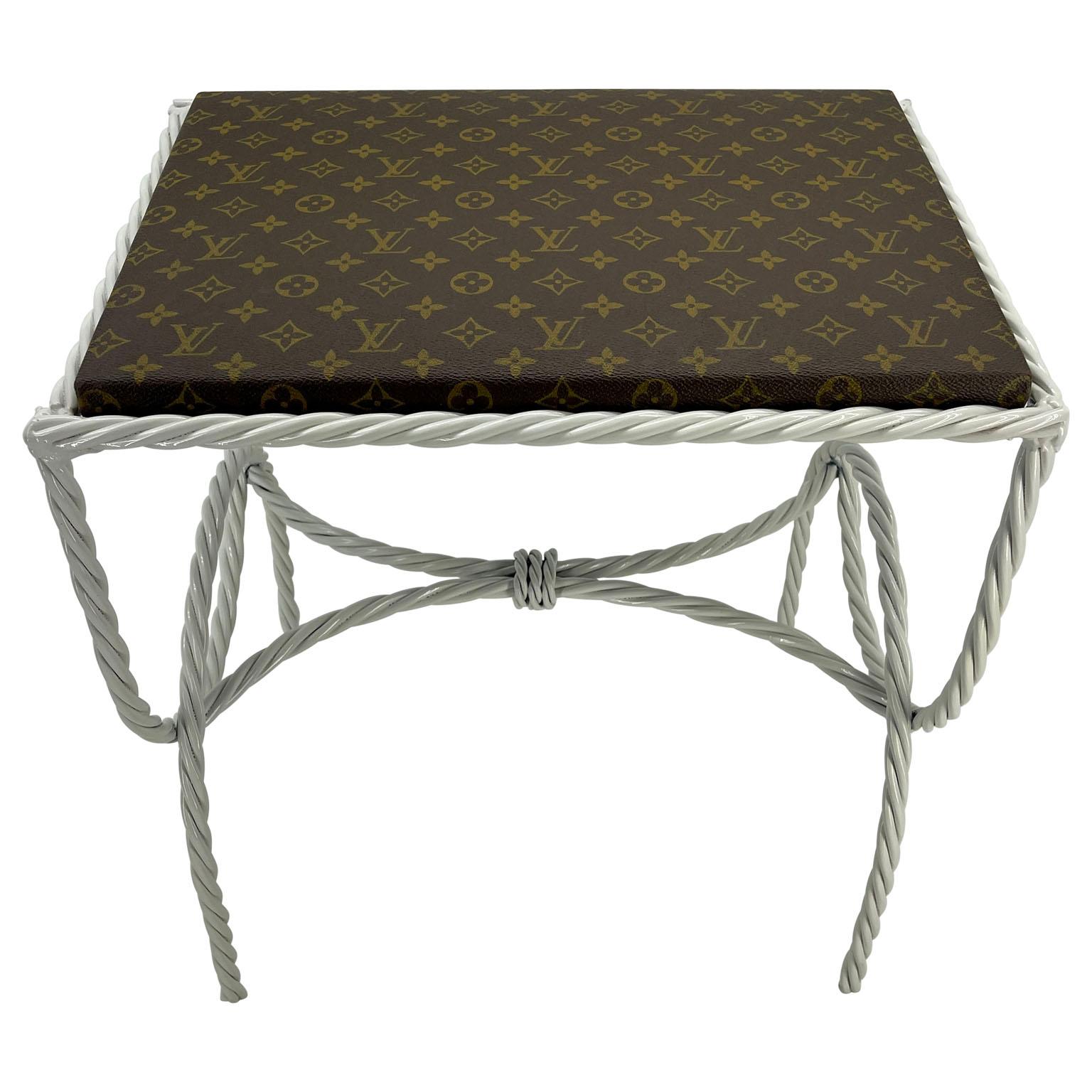 Rope Benches Side Tables Stools with Louis Vuitton Monogram Fabric, A Pair

Design and purpose best describe this one-of-a-kind custom set. This pair features authentic classic Monogram Louis Vuitton fabric seats atop very sturdy freshly