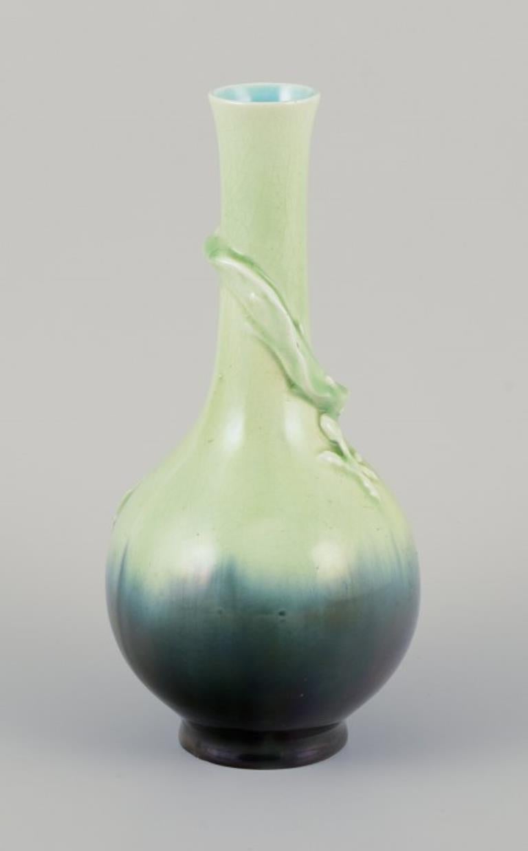 Glazed Pair of Rörstrand Art Nouveau faience vases. Relief motif of lizards. For Sale