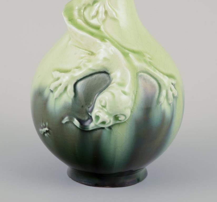 20th Century Pair of Rörstrand Art Nouveau faience vases. Relief motif of lizards. For Sale