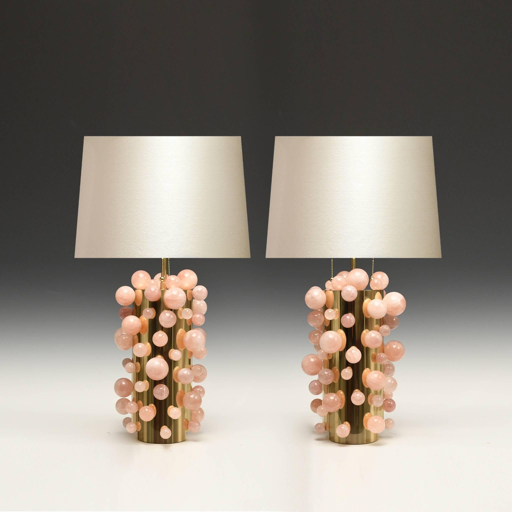 Pair of rose rock crystal bubble lamps with polish brass finish, created by Phoenix Gallery, NYC.
To the top of the rock crystal: 13.5 in/H.
The lampshade is not included.