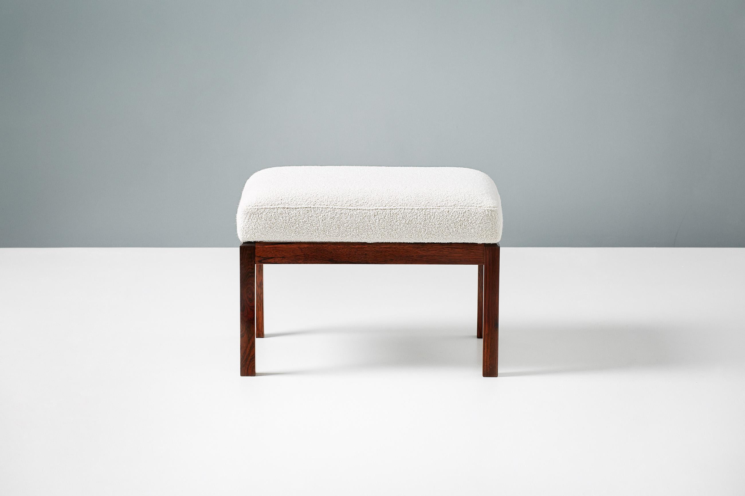 Pair of rectangular ottomans, produced in Denmark in the 1950s. Solid rosewood frames with rectangular seats covered in new off-white luxury bouclé fabric.
 
 
  
