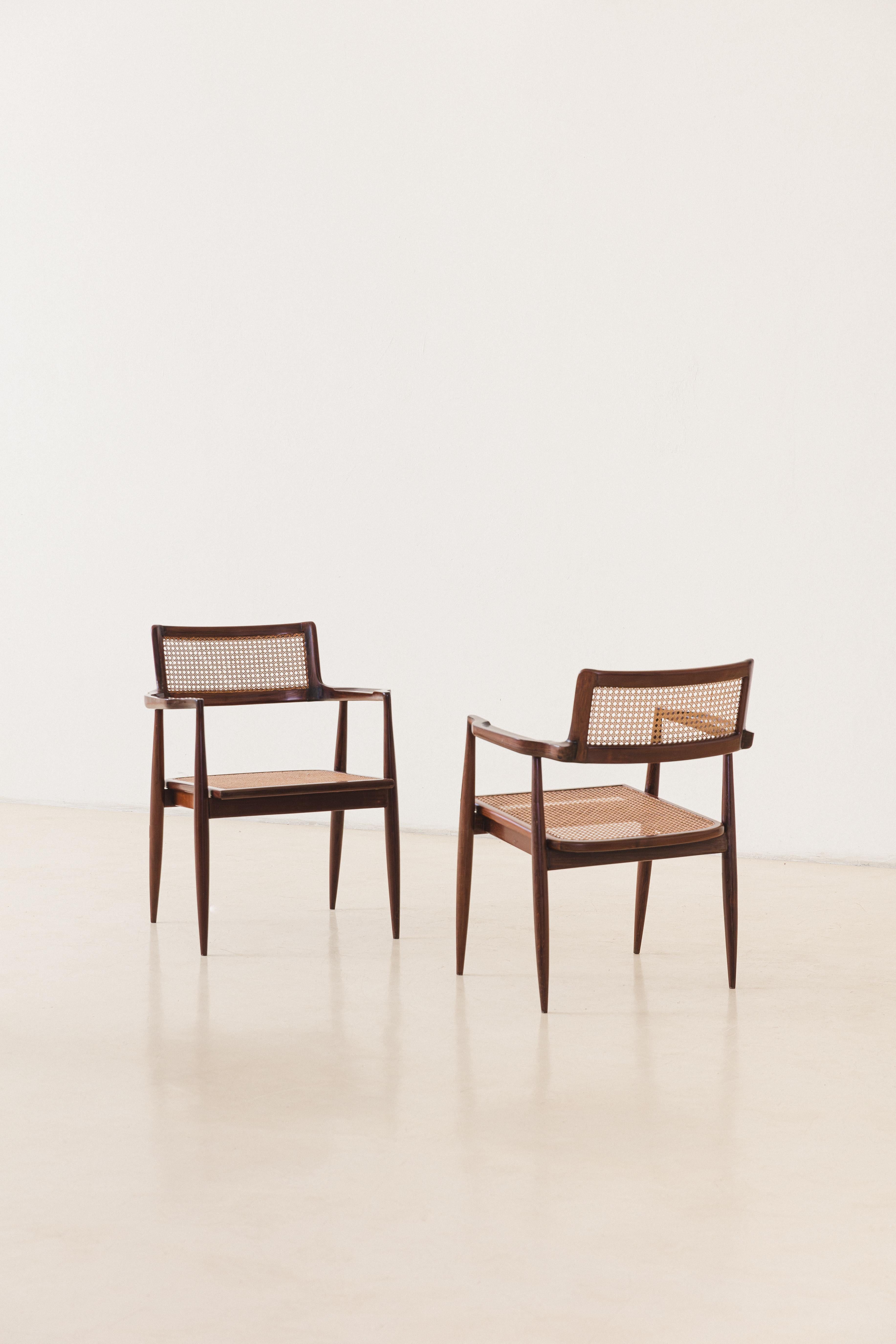 Pair of Rosewood and Cane Armchairs Brazilian Design by Joaquim Tenreiro, C.1947 In Good Condition In New York, NY