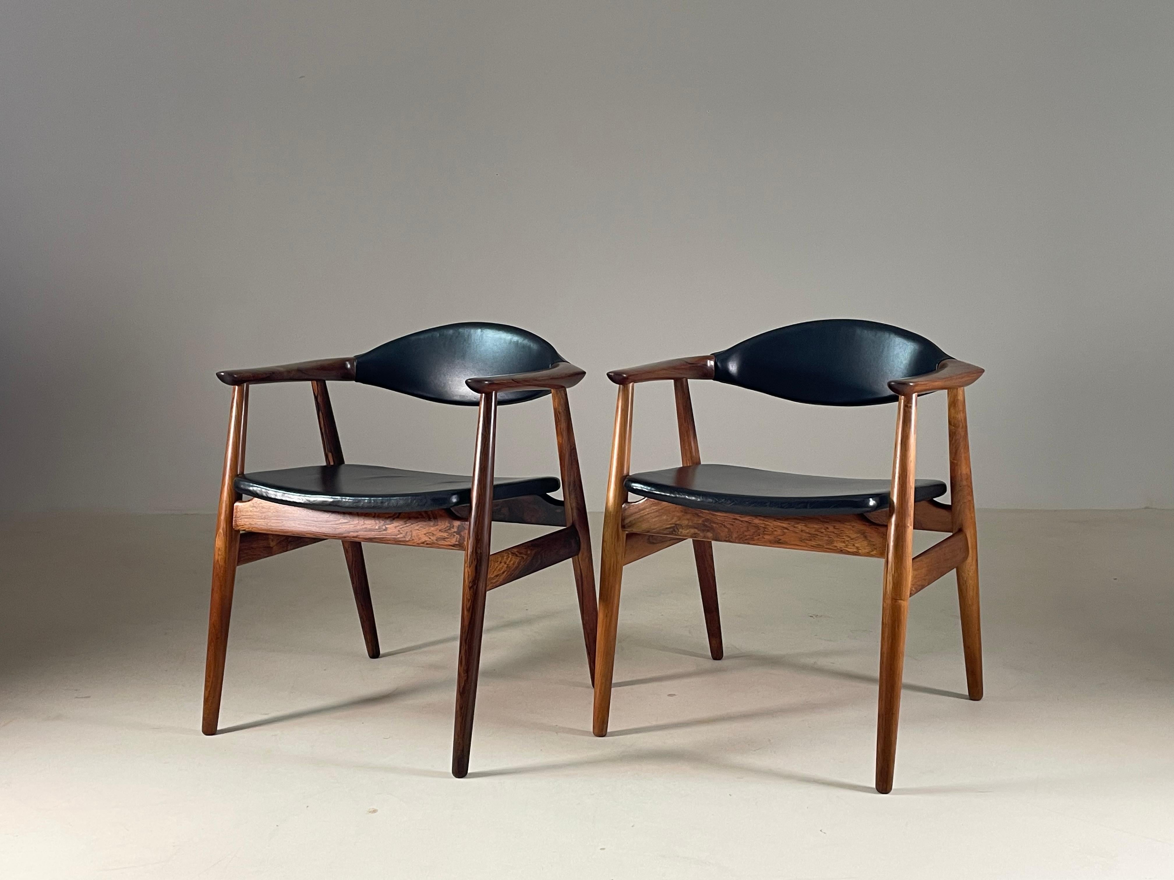 Elegant and timeless, this pair of armchairs by Erik Kirkegaard embodies the essence of 1960s Scandinavian design. Made in Denmark, these armchairs are distinguished by the exceptional quality of their Rio rosewood frame, a precious wood that is now