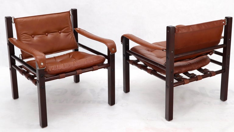 Pair of midcentury Danish modern solid Brazilian rosewood frames Safari chairs.