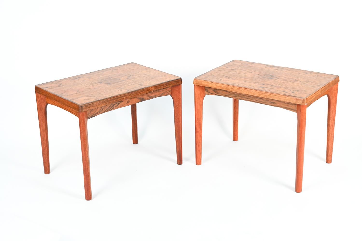 An attractive pair of Danish mid-century rosewood side tables designed by Henning Kjaernulff and produced by Vejle Stole Møbelfabrik, with manufacturer's stamp underneath.