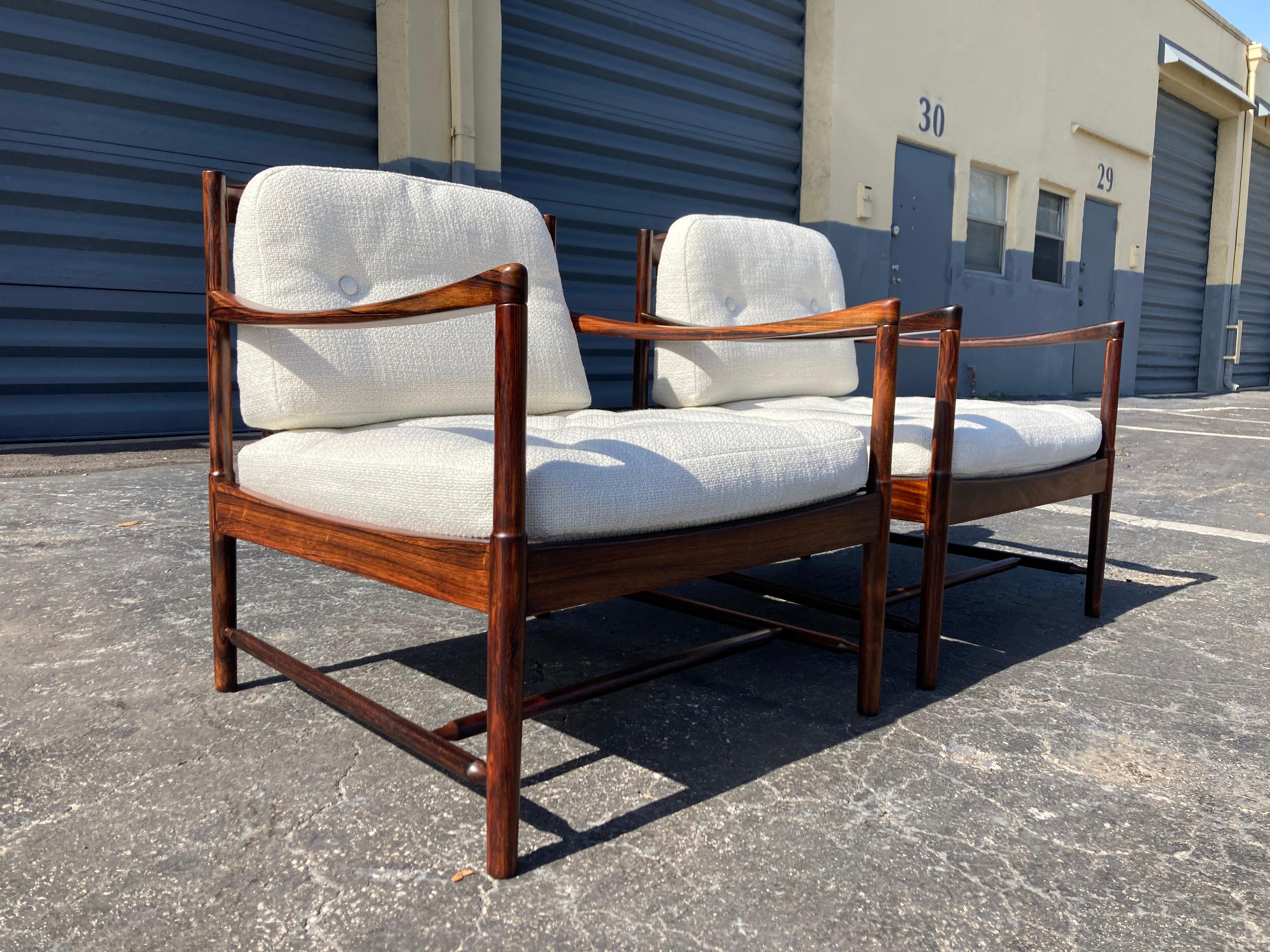 Pair of Rosewood Lounge Chairs Attributed to Kofod Larsen. Frames were fully restored, new high quality ivory white fabric cushions. Ready for new home.