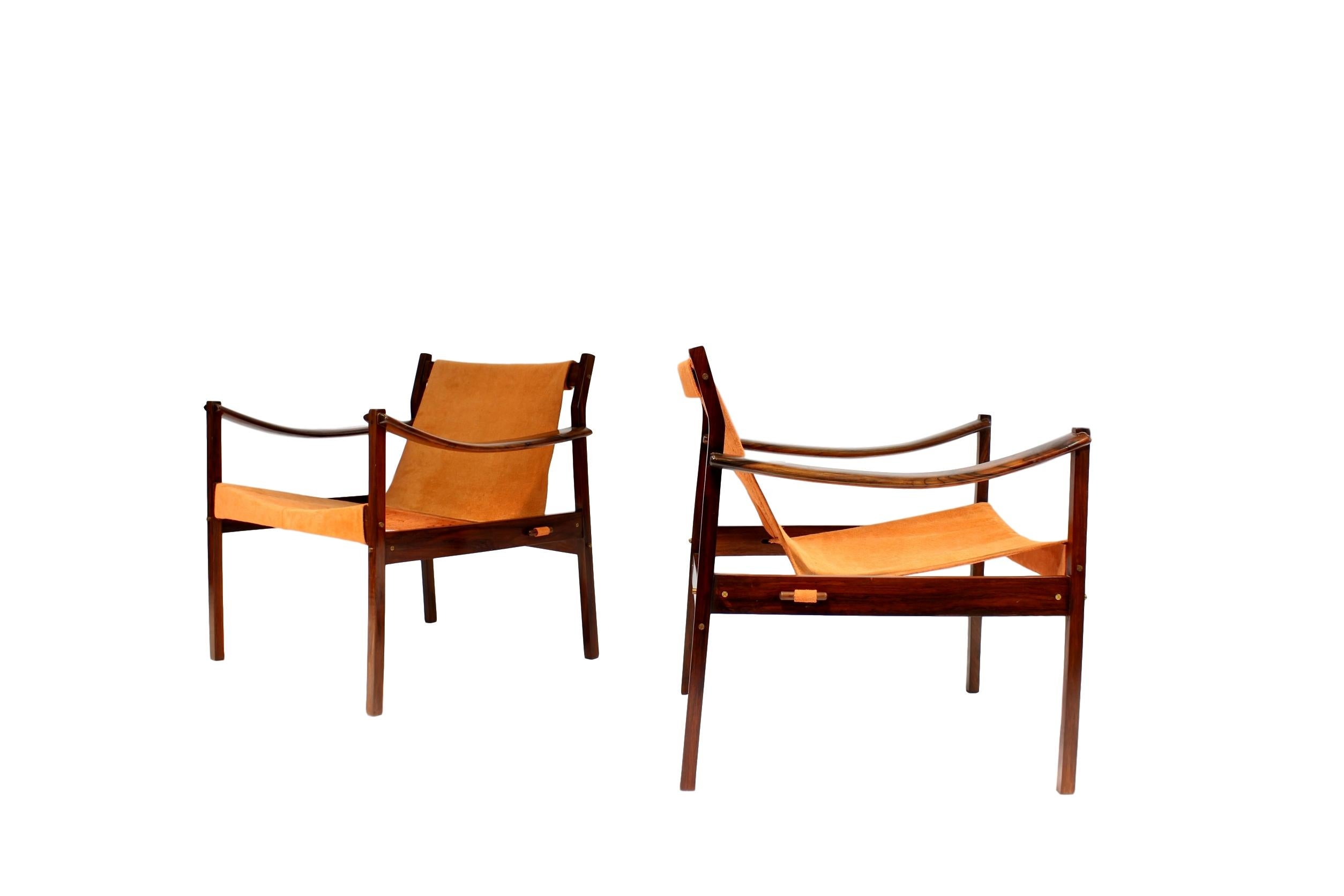 Set of two armchairs model 720, in rosewood and leather by Jorge Zalszupin for L'Atelier, Brazil, the 1960s. This scarce model has a very sensual design with a well-made rosewood frame. The wonderfully curved arms show outstanding craftsmanship and