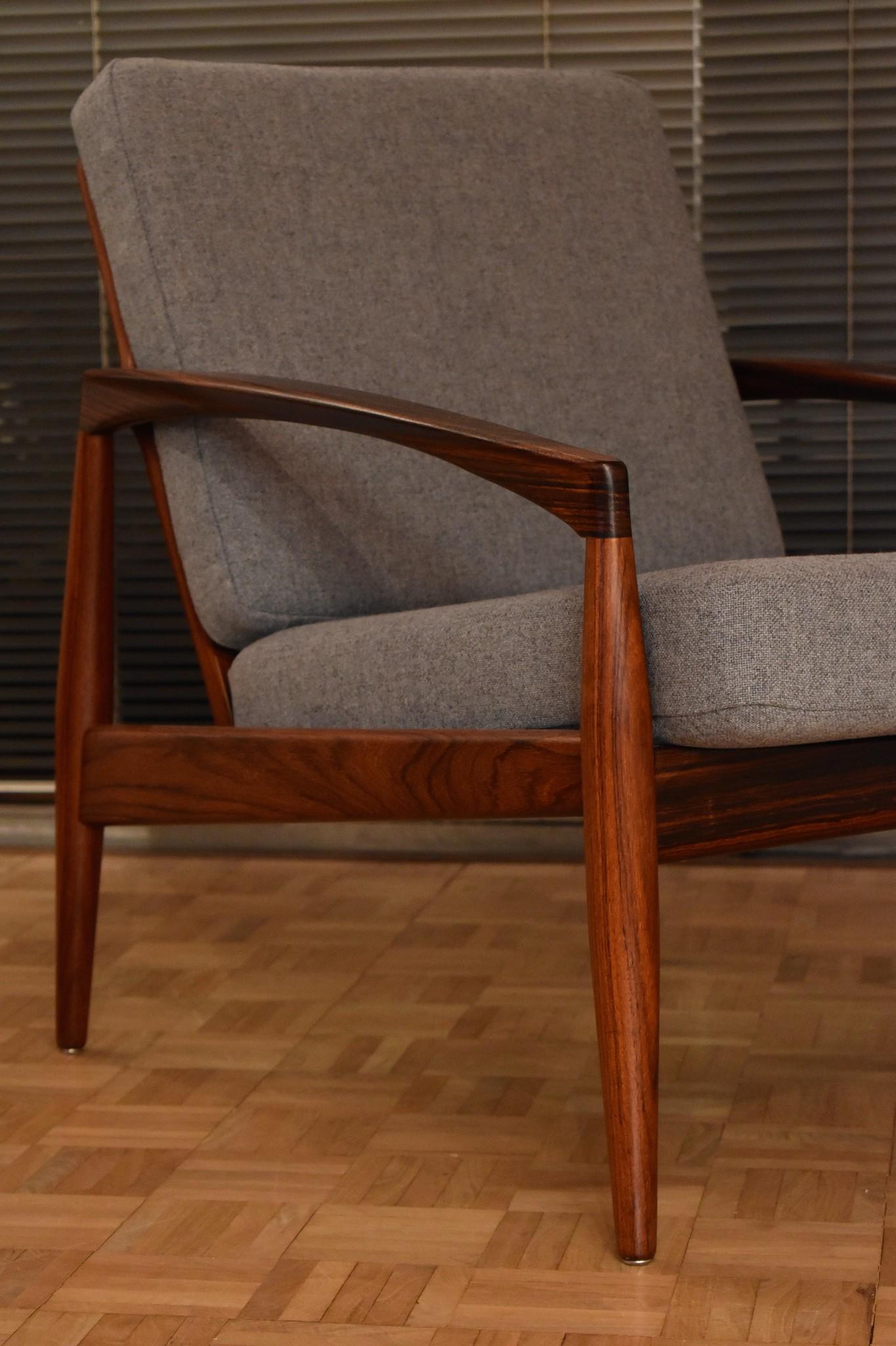An outstanding pair of solid rosewood Model 121 ‘Paperknife’ chairs designed in the late 1950s by Kai Kristiansen.

Produced to a very high standard by Magnus Olesen, Denmark. The original cushions have been reupholstered using Kvadrat fabric.