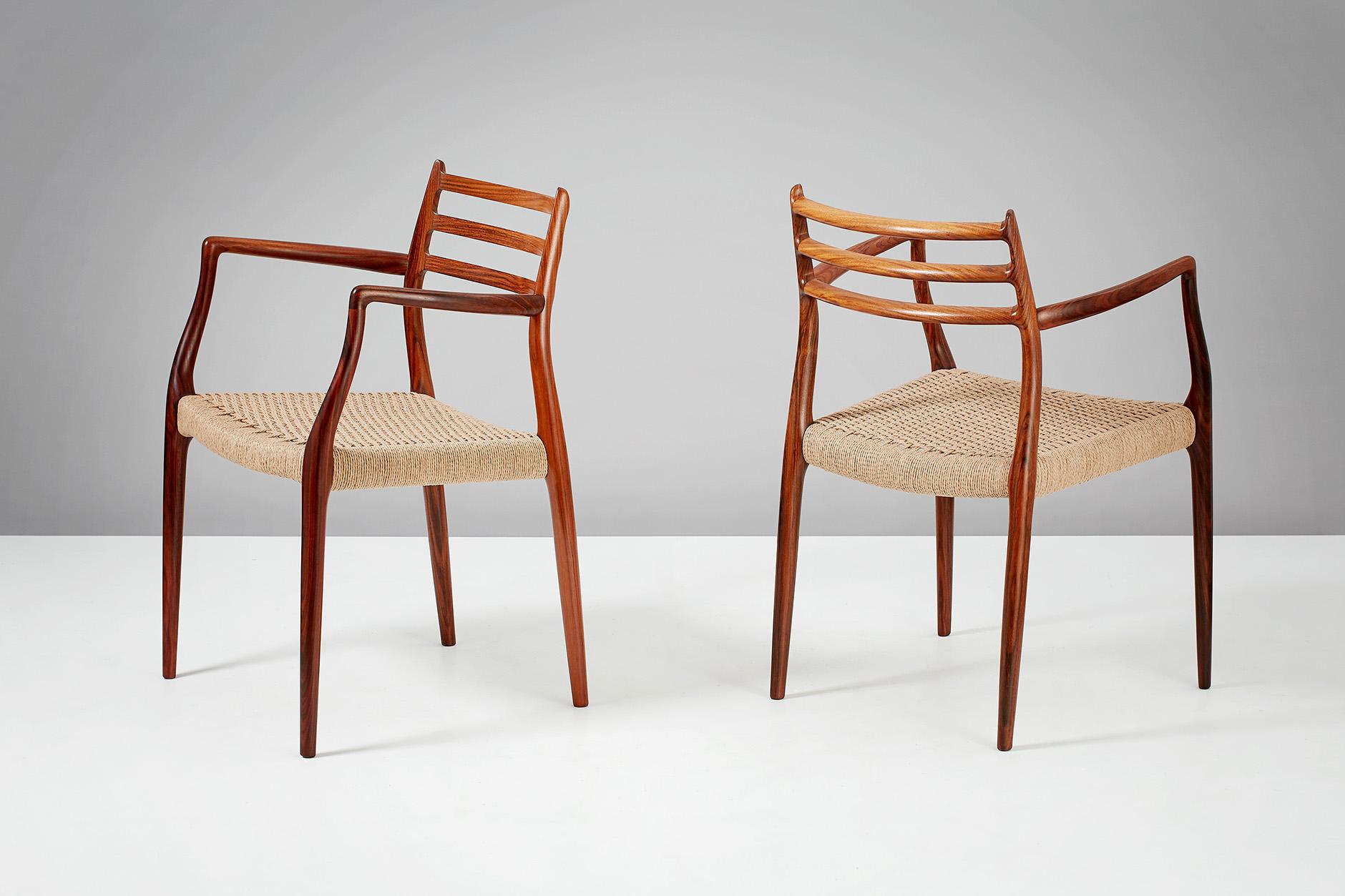 Niels Moller

Model 62 armchair, 1962.

Rosewood armchairs designed by Niels Moller for J.L. Moller Mobelfabrik, Denmark, 1962. Newly woven papercord seats.

Measures: H 80cm / D 55cm / W 56cm.
 
