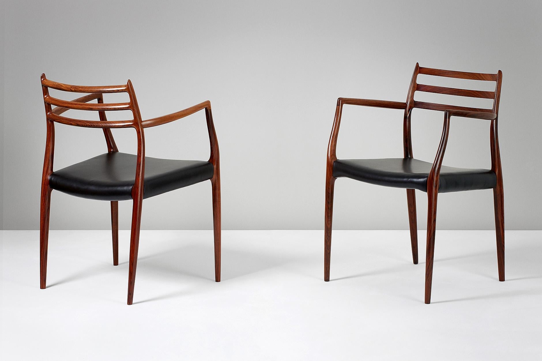 Niels Moller

Model 62 armchair, 1962

Rosewood armchairs designed by Niels Moller for J.L. Moller Mobelfabrik, Denmark, 1962. New black aniline leather seats. 

Dimensions: H 80cm, D 55cm, W 56cm

  