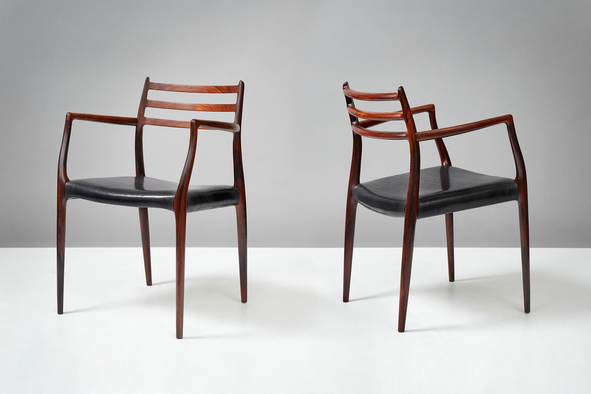 Scandinave moderne Paire de fauteuils en bois de rose modèle 62 par Niels Moller, 1962 en vente