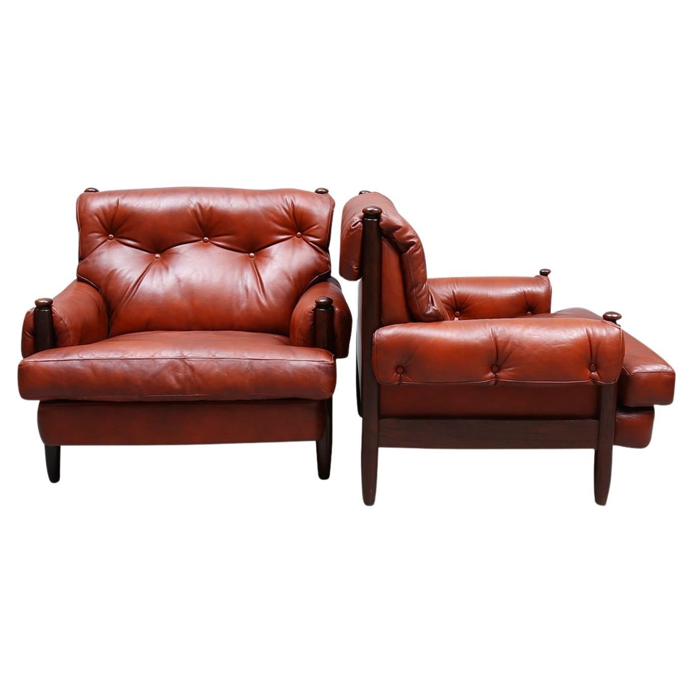 Pair of Rosewood + Rust Leather Lounge Chairs For Sale at 1stDibs