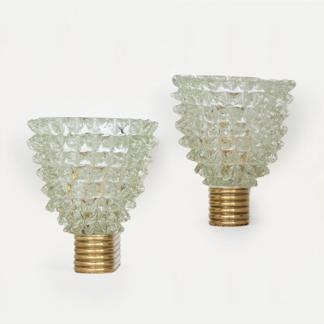 Beautiful pair of 1940's rostrato sconces with spikey glass by Barovier. Original ribbed brass fixture showing nice age and patina. Newly rewired. 
Original backplate measures 1.75