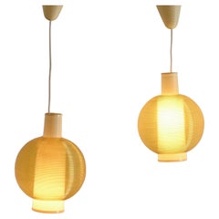 Pair of Rotaflex Pendant Lights, France circa 1960
