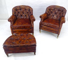 Pair of Rouge Leather Vintage Tufted Leather Chesterfield Armchairs and Ottoman