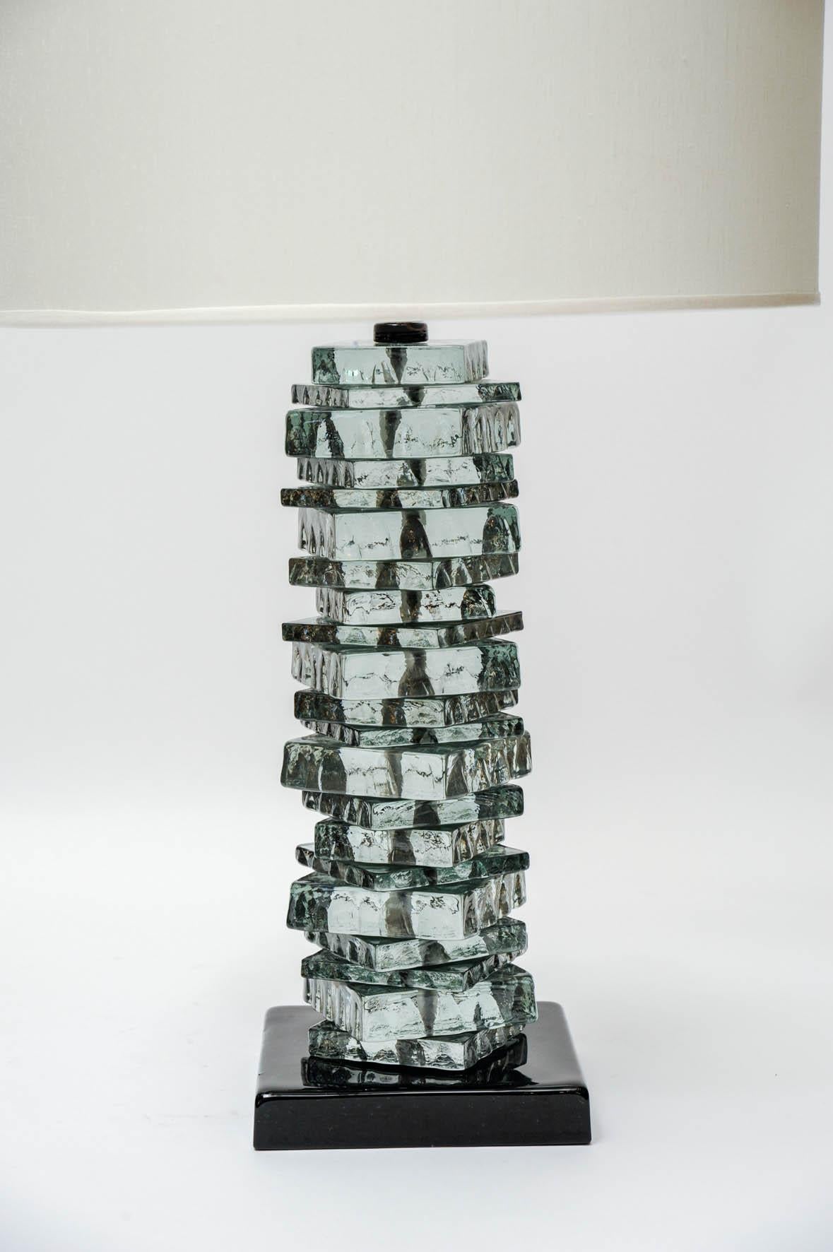 Pair of Murano glass table lamps made of a stack of square tiles with rough edges.