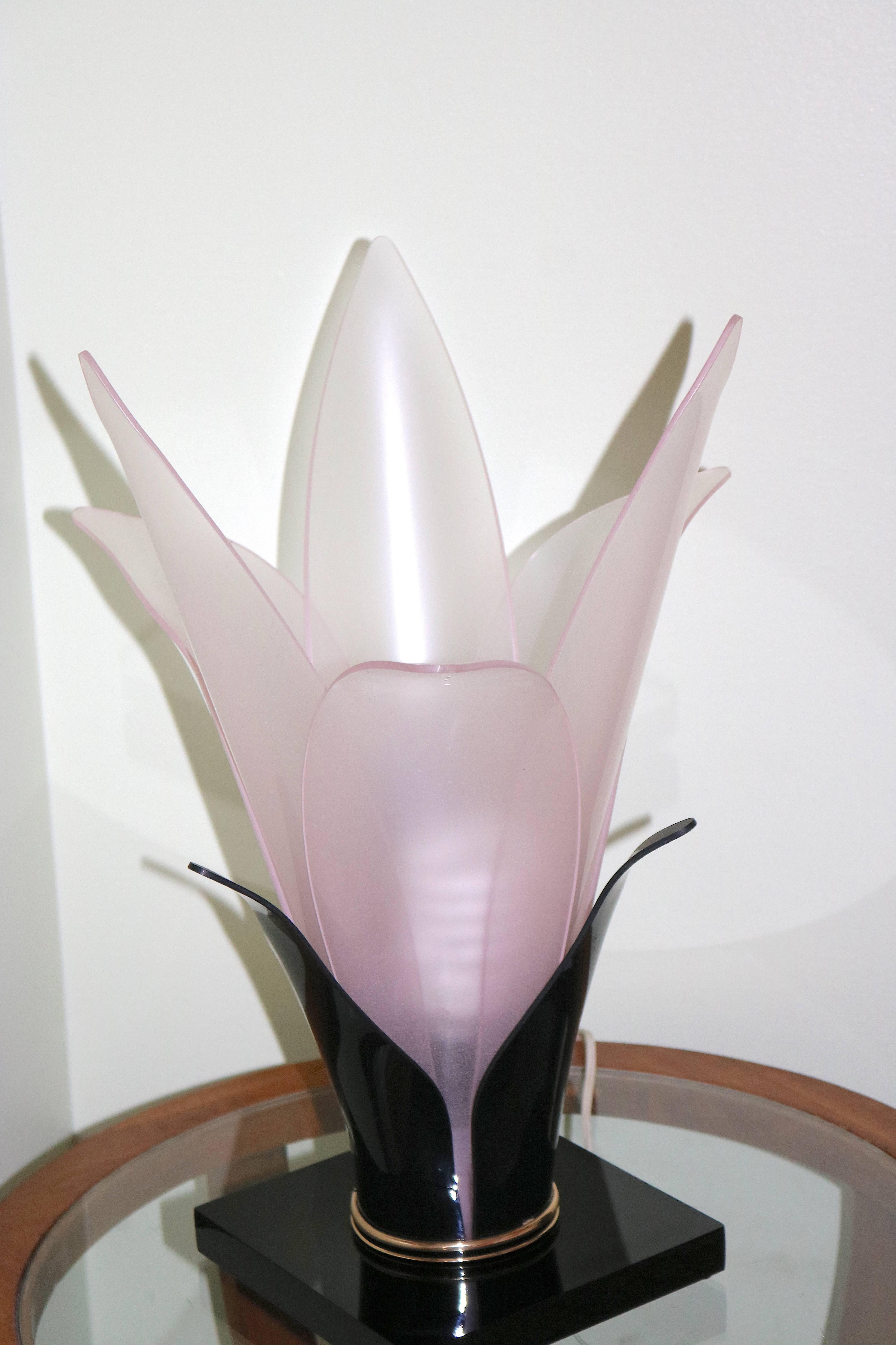 Gorgeous Luxe 1970s pair of Roger Rougier Lucite Tulip table lamps in the most beautiful coloration pink and black--translucent pink and opaque black petals with brass ring around the base and black Lucite base. Lovely to look at when light is on or