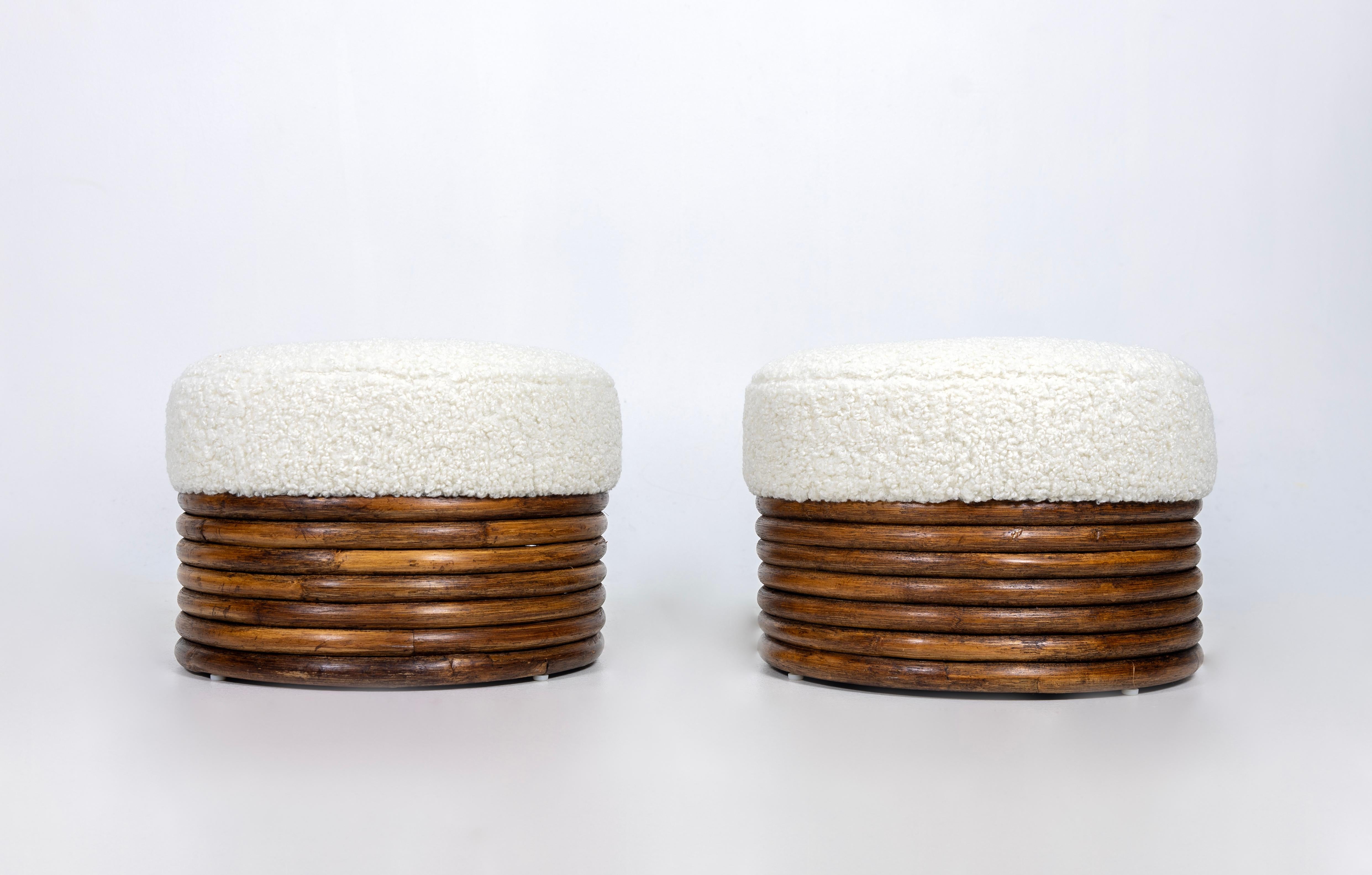 Pair of Bamboo Ottomans with beige boucle seats. Ready for a new home.